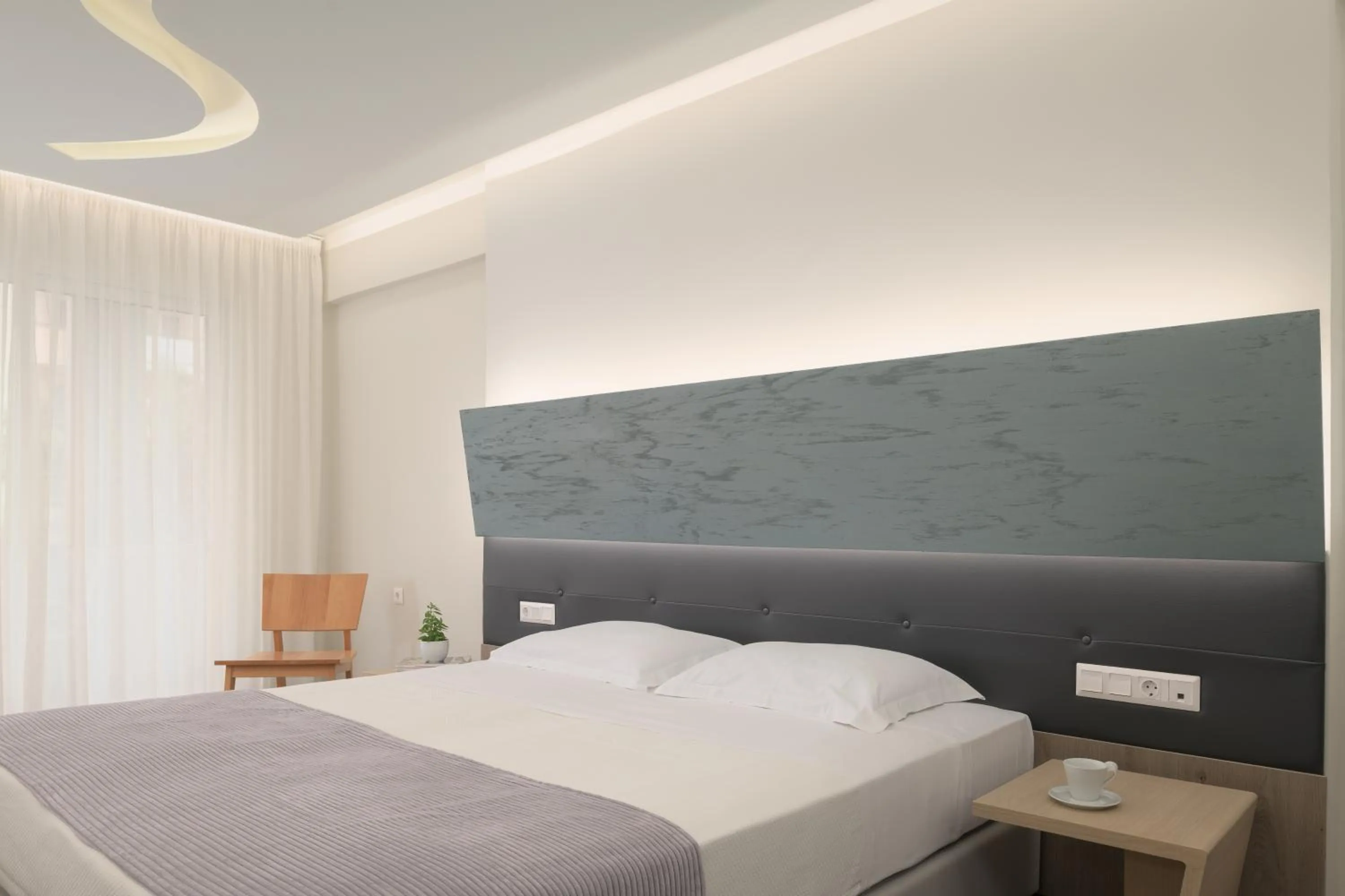 Bed in Melrose Rethymno by Mage Hotels