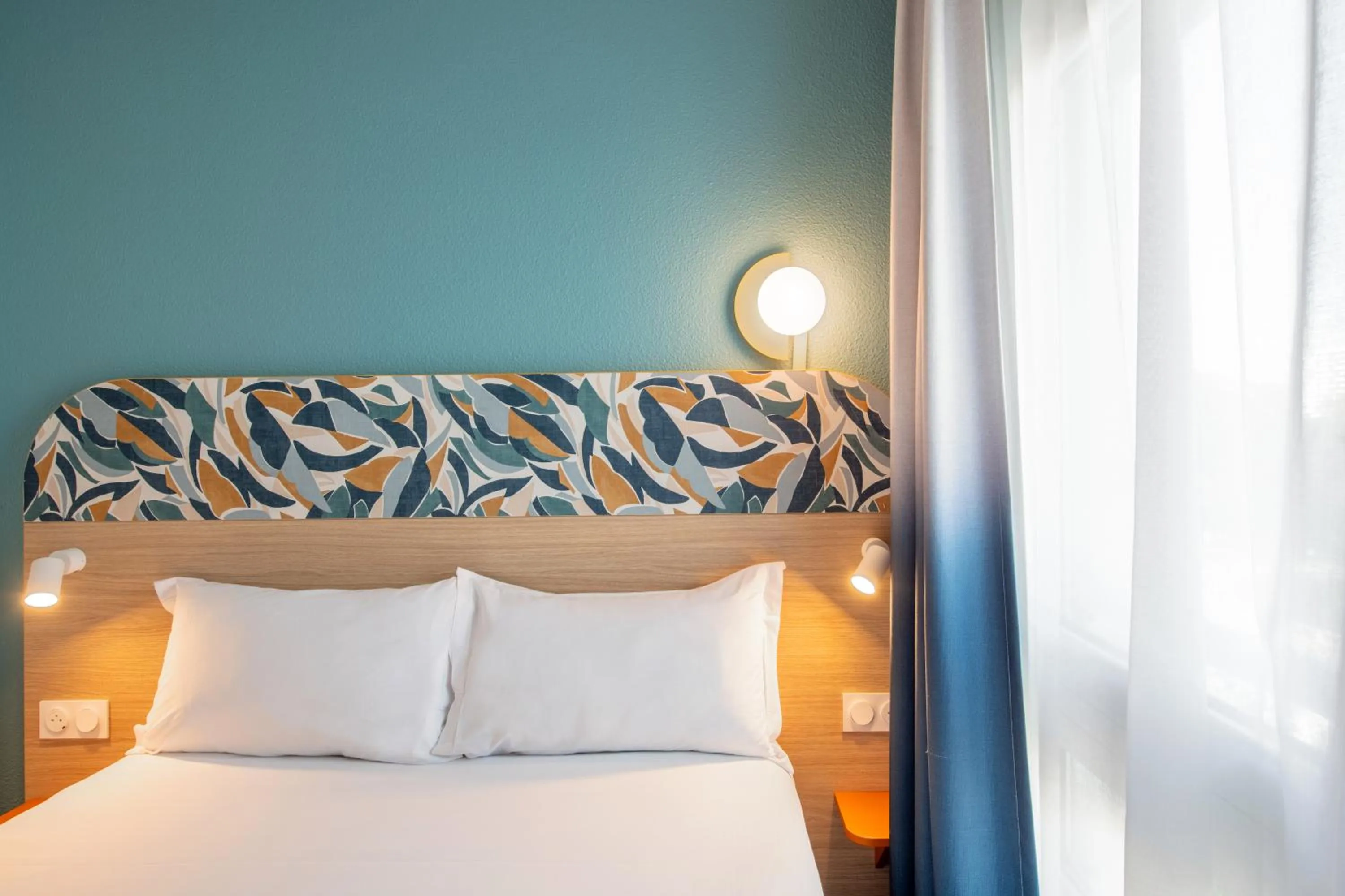 Bed in Aparthotel Adagio Access Paris La Villette