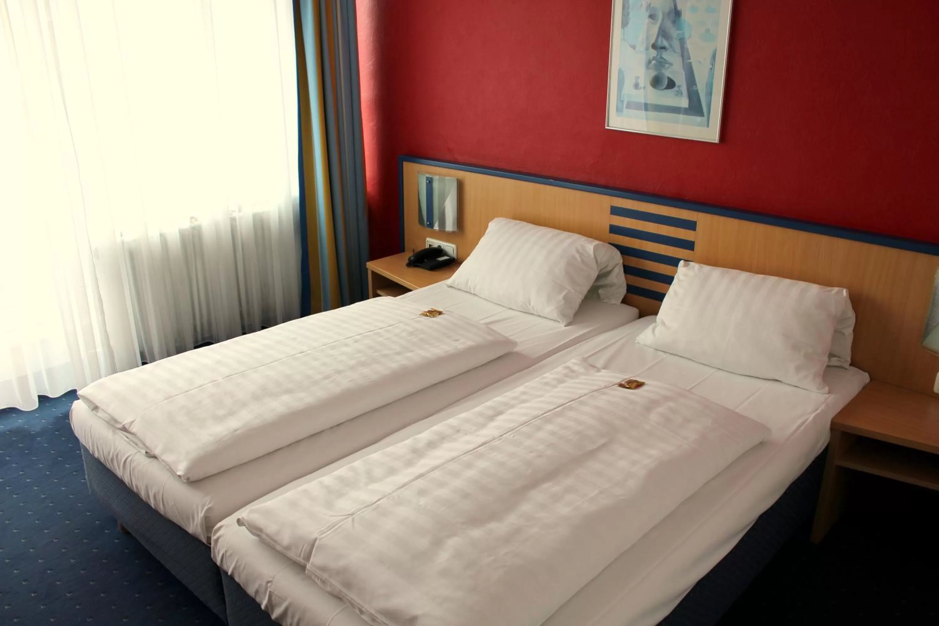 Bed in NP Hotel Wallis