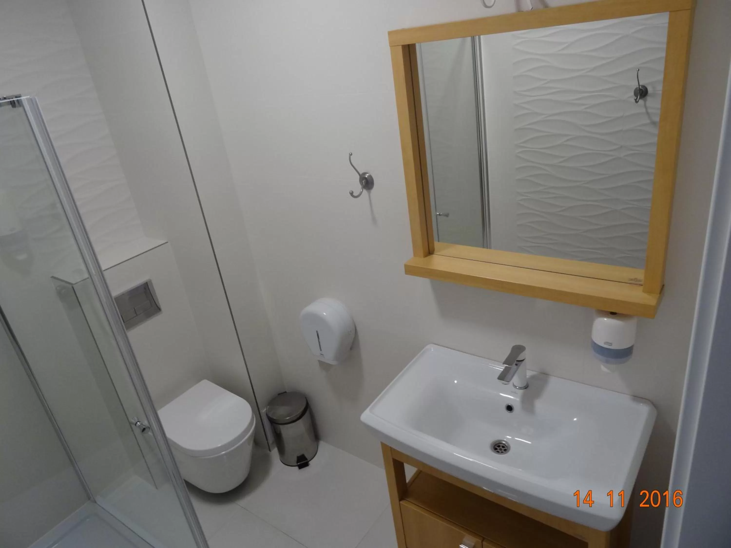 Bathroom in Carina Hotel