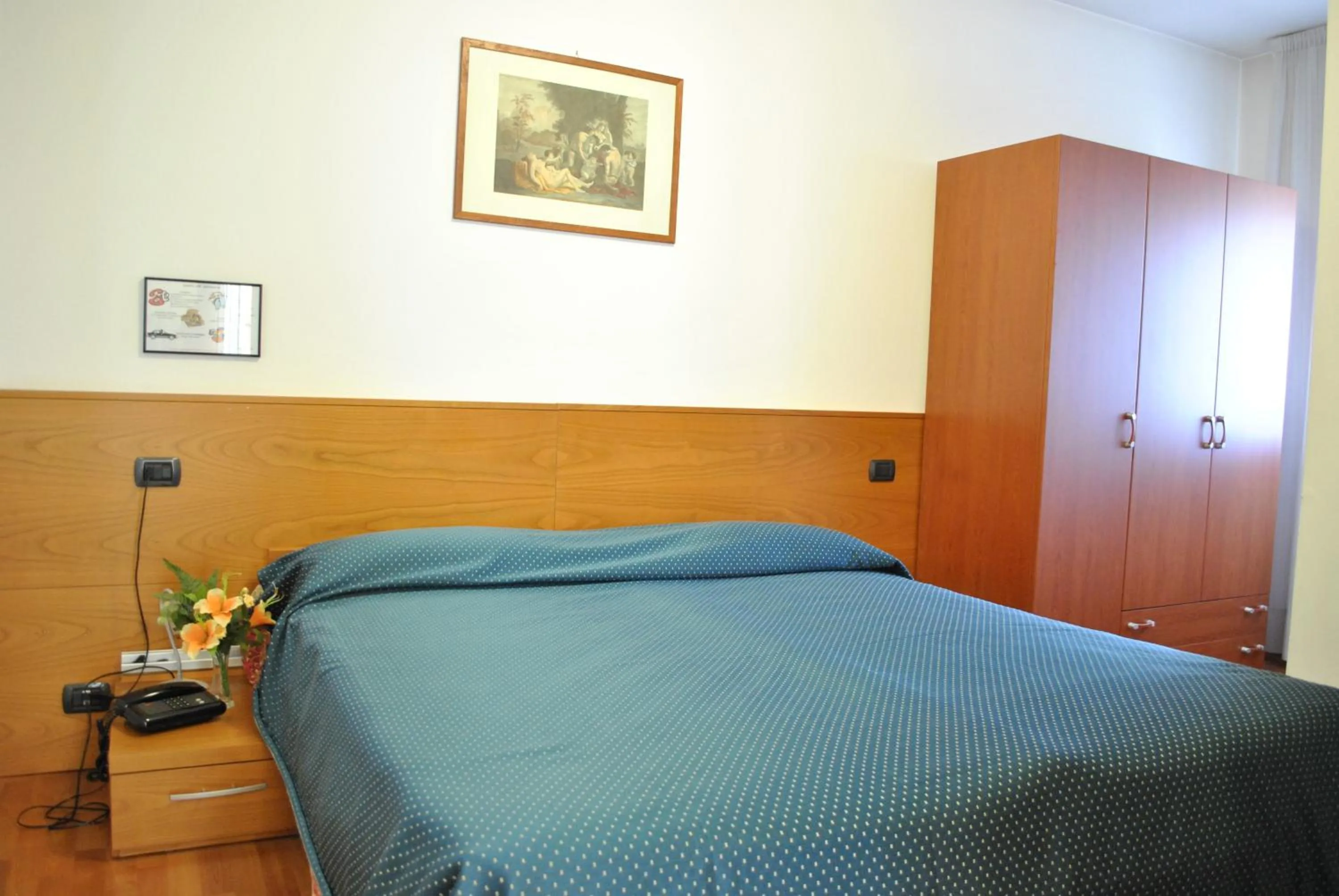 Bed in Rometta Hotel