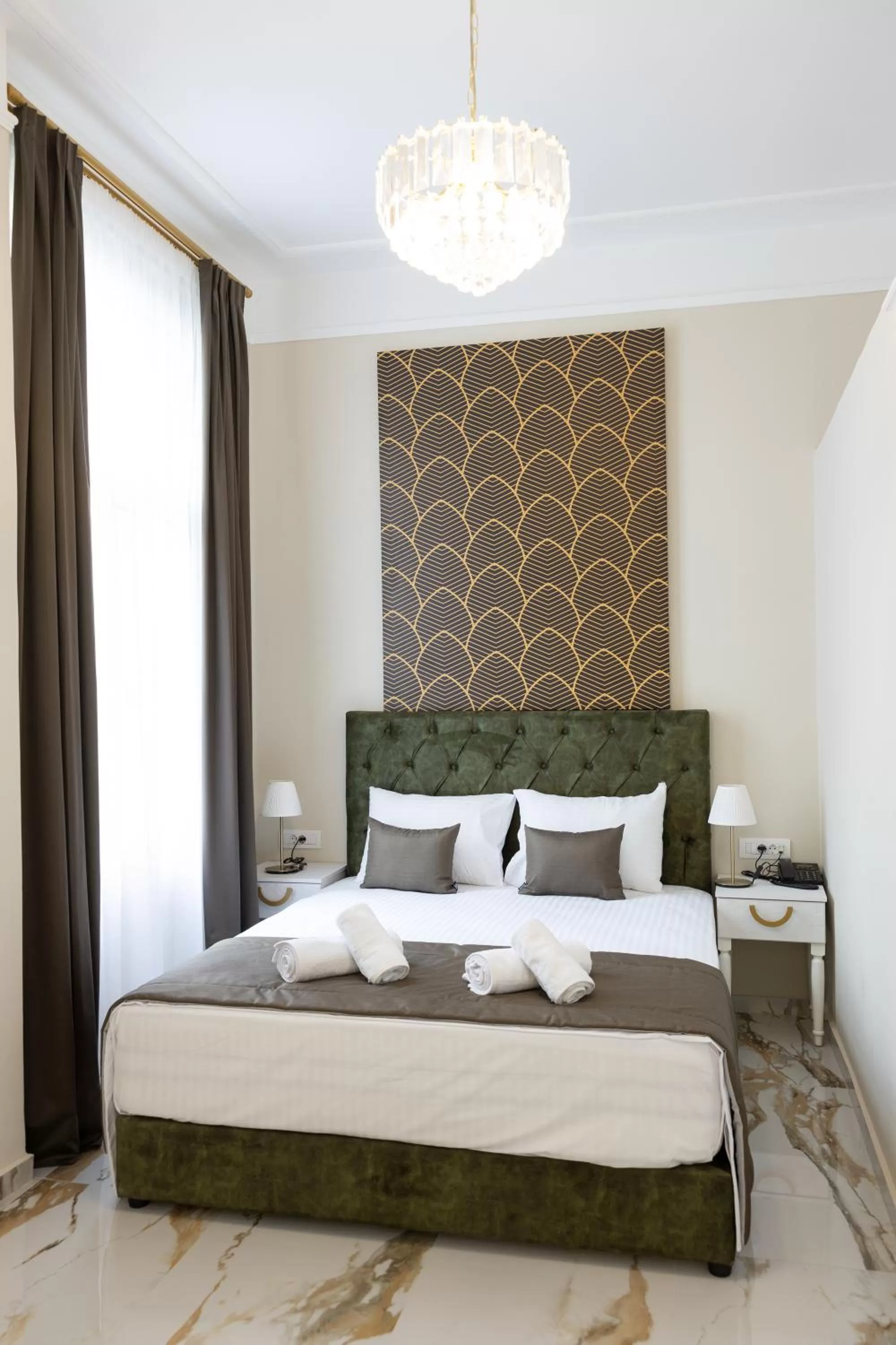 Bed in Modern Revival Luxury Hotel