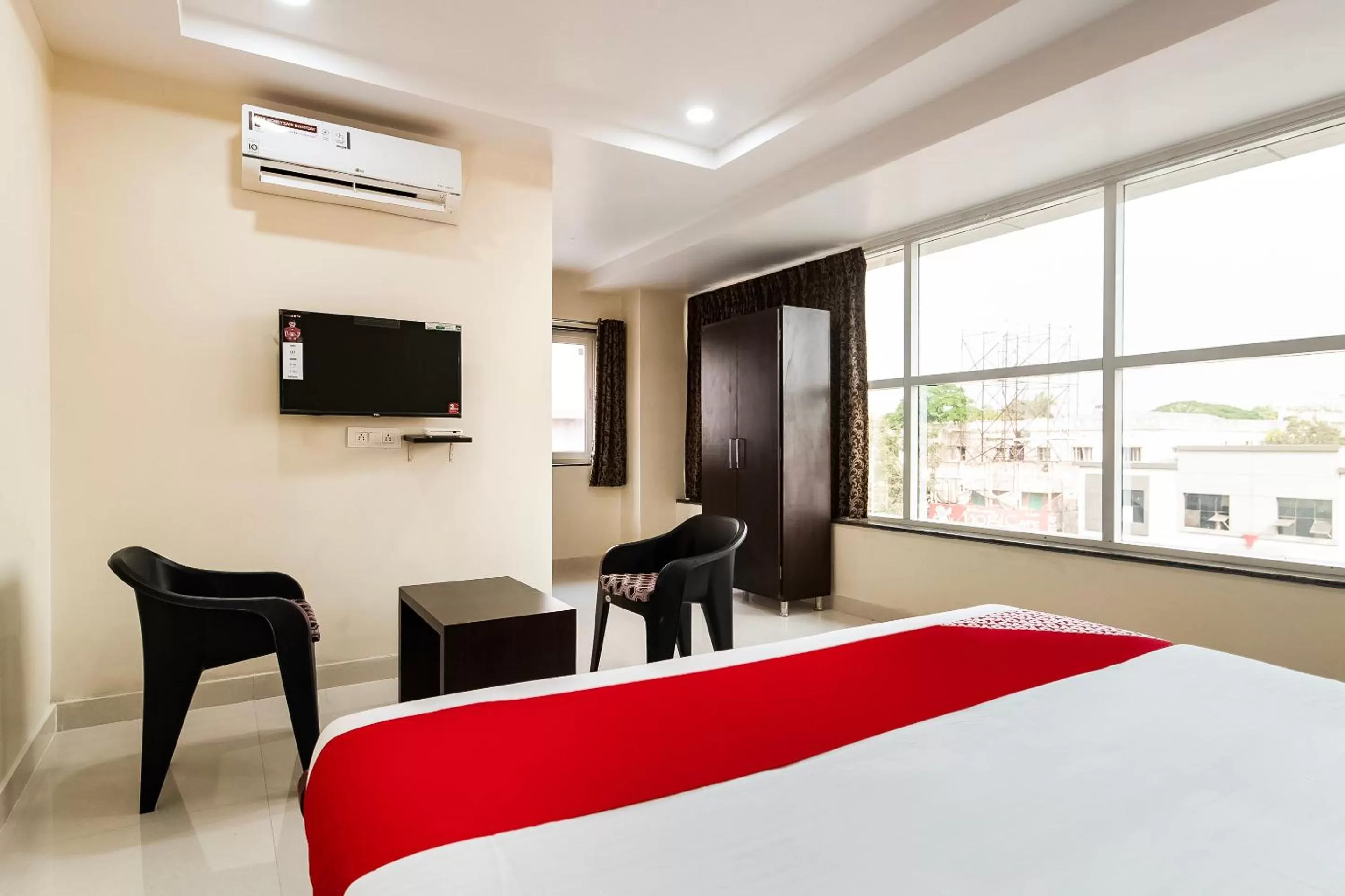 Bedroom in Capital O Hotel Green Tree