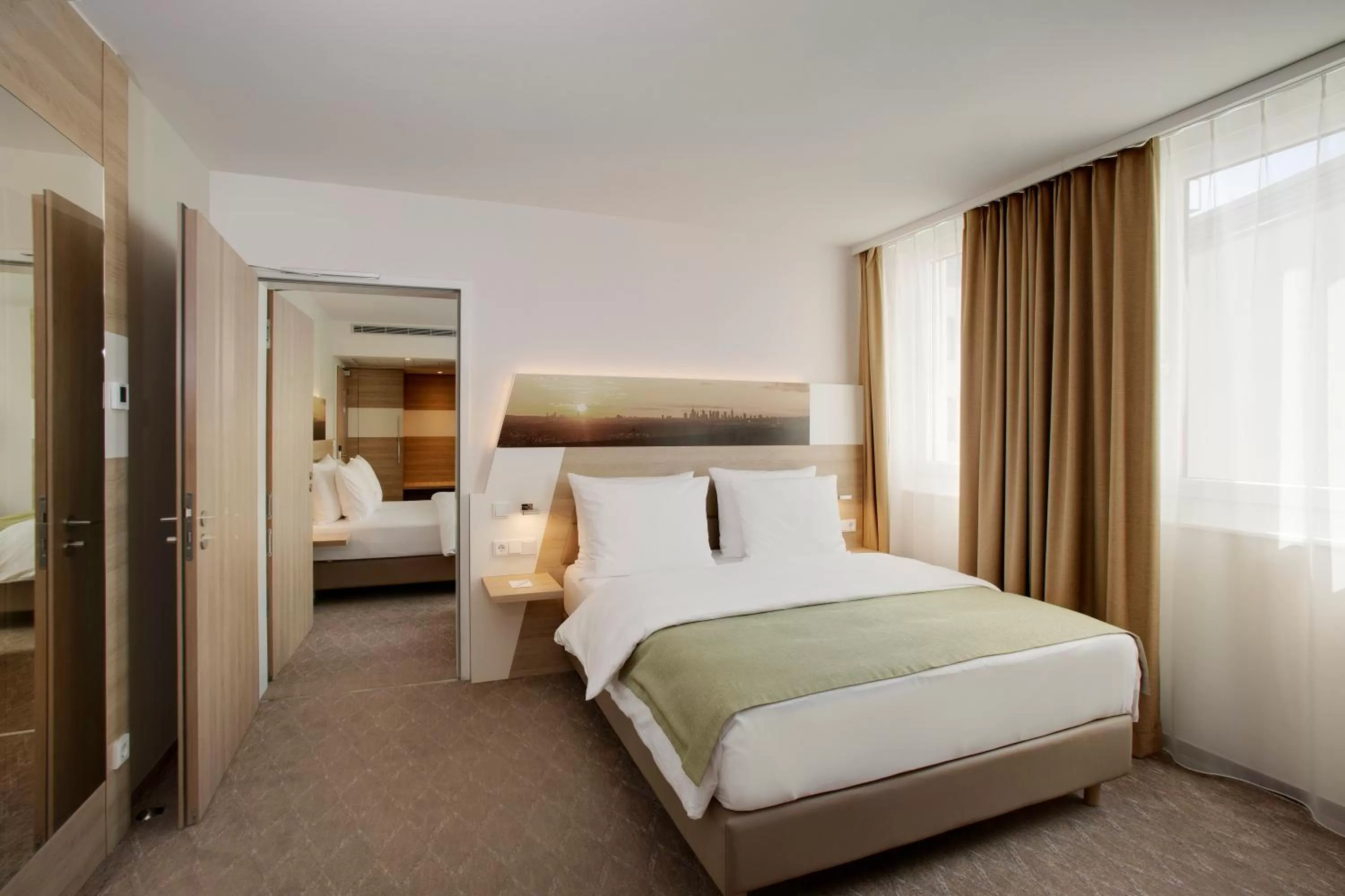 Photo of the whole room, Bed in Holiday Inn Frankfurt Airport by IHG