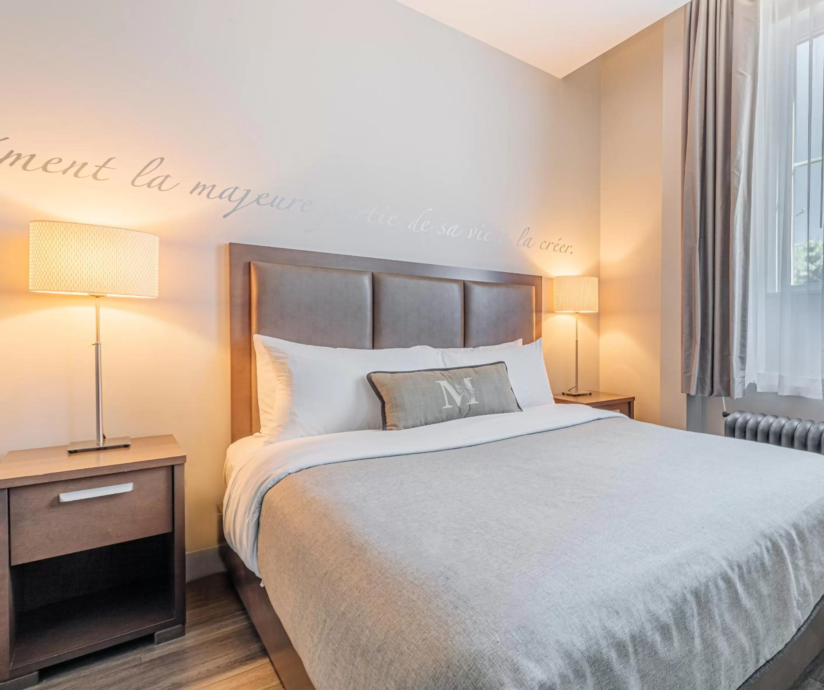 Bed in Hotel Montfort Nicolet