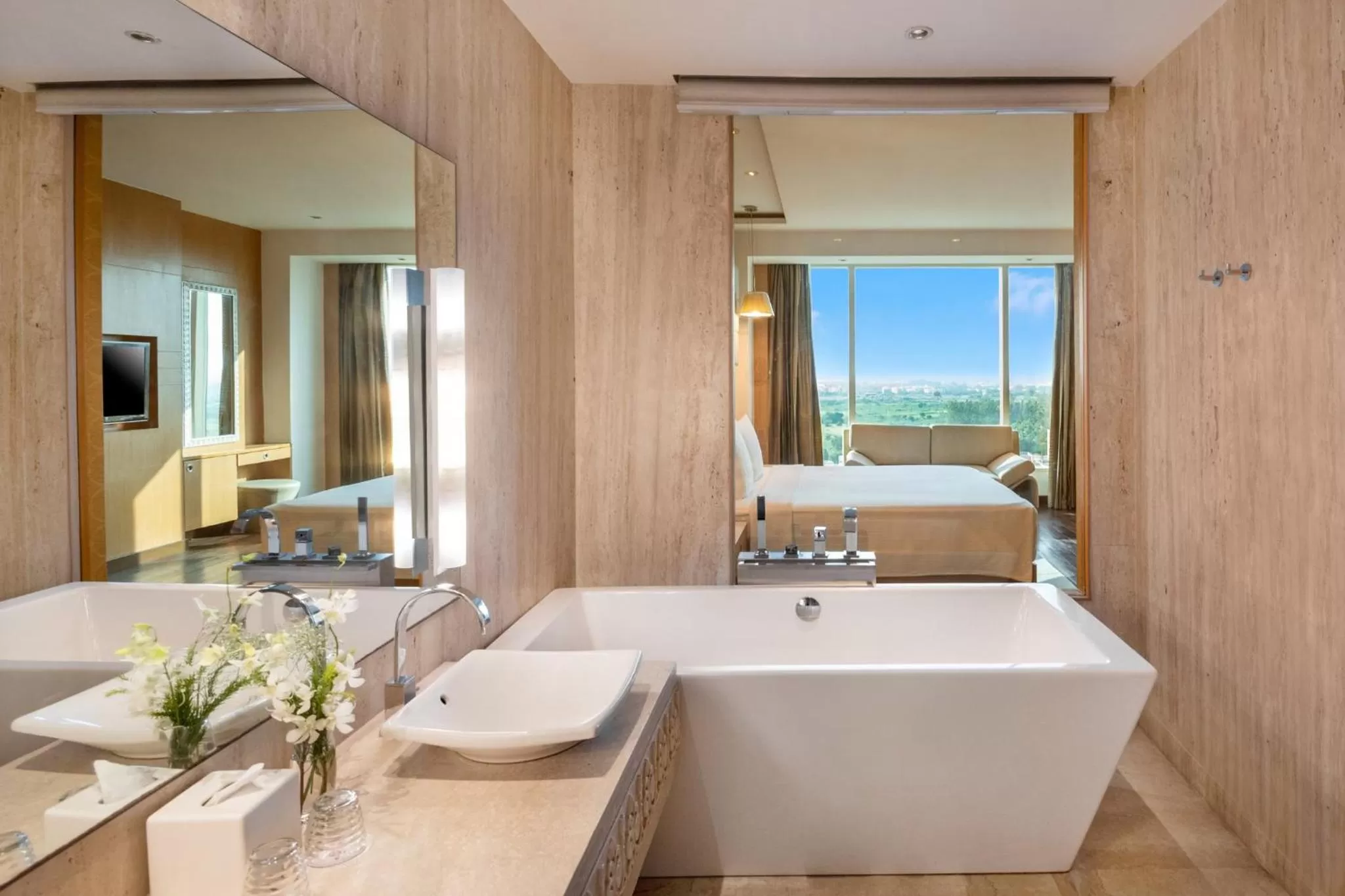 Bathroom in Crowne Plaza Greater Noida by IHG