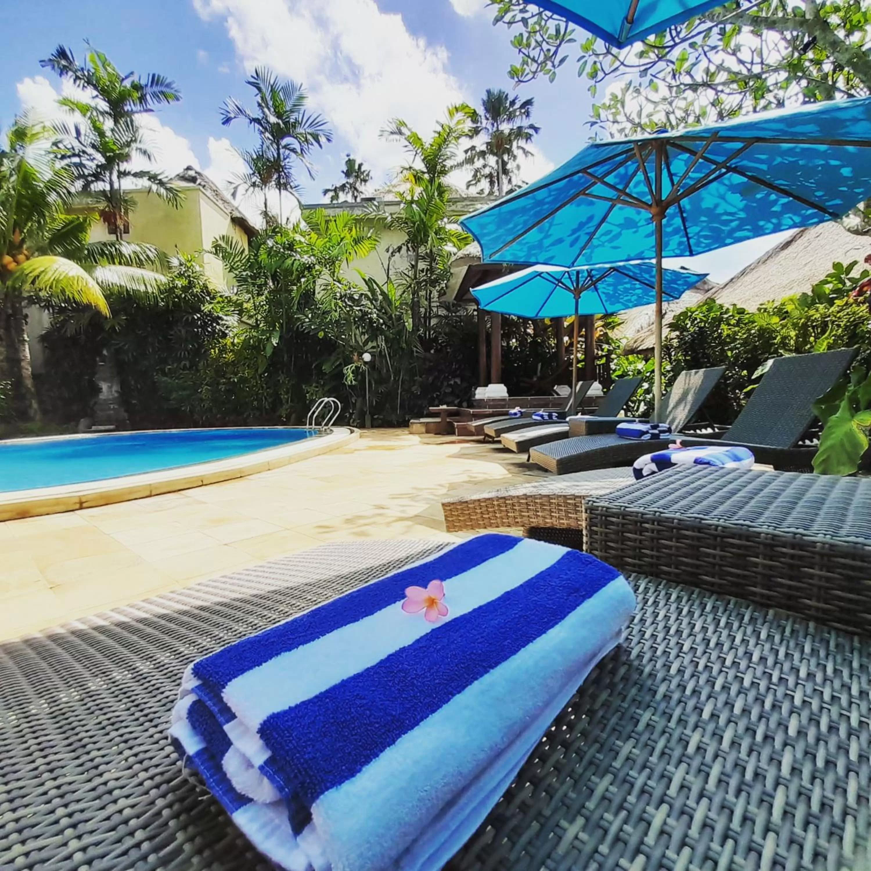 Swimming pool in Sama's Cottages and Villas