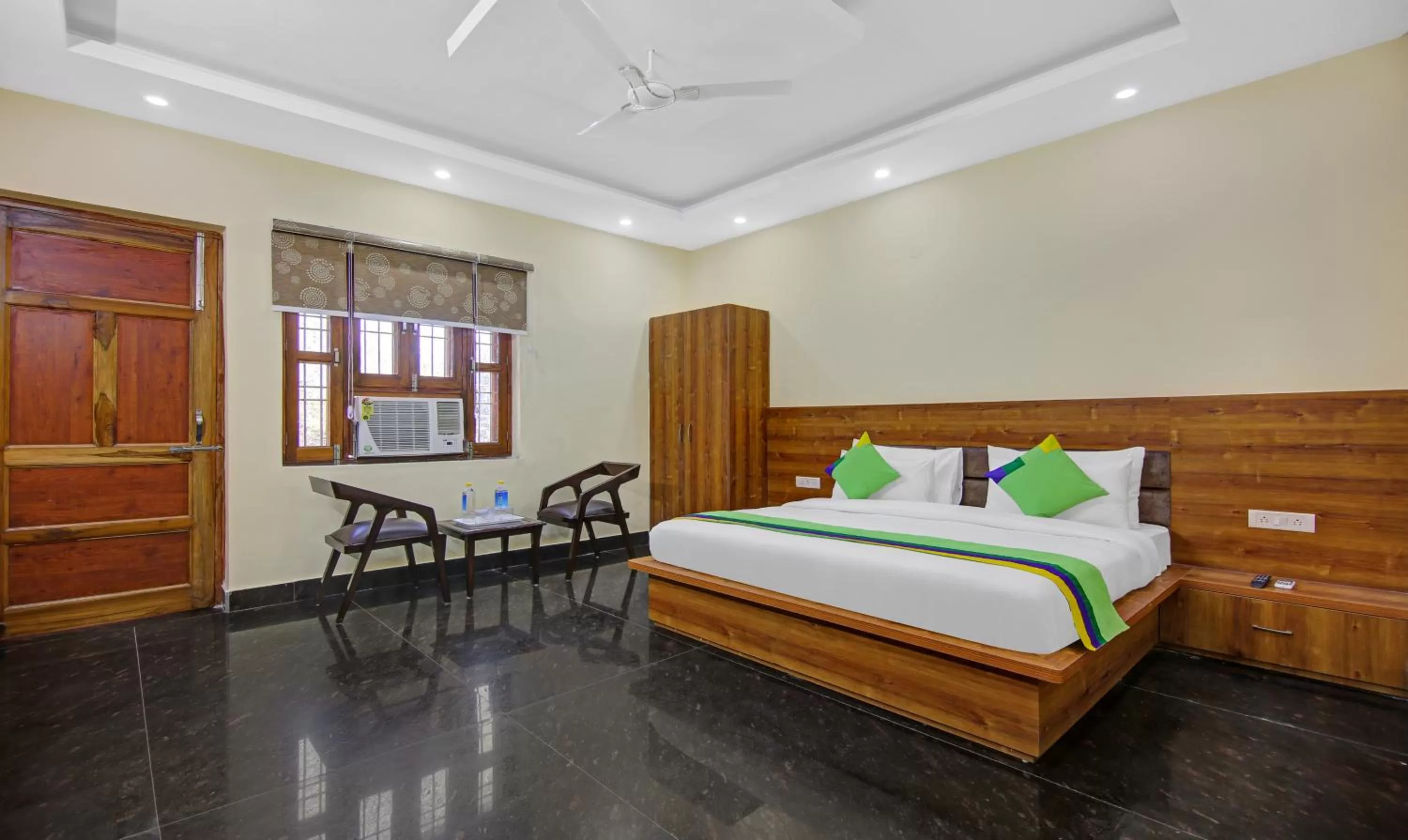 Bedroom, Bed in Treebo The Eden Roc