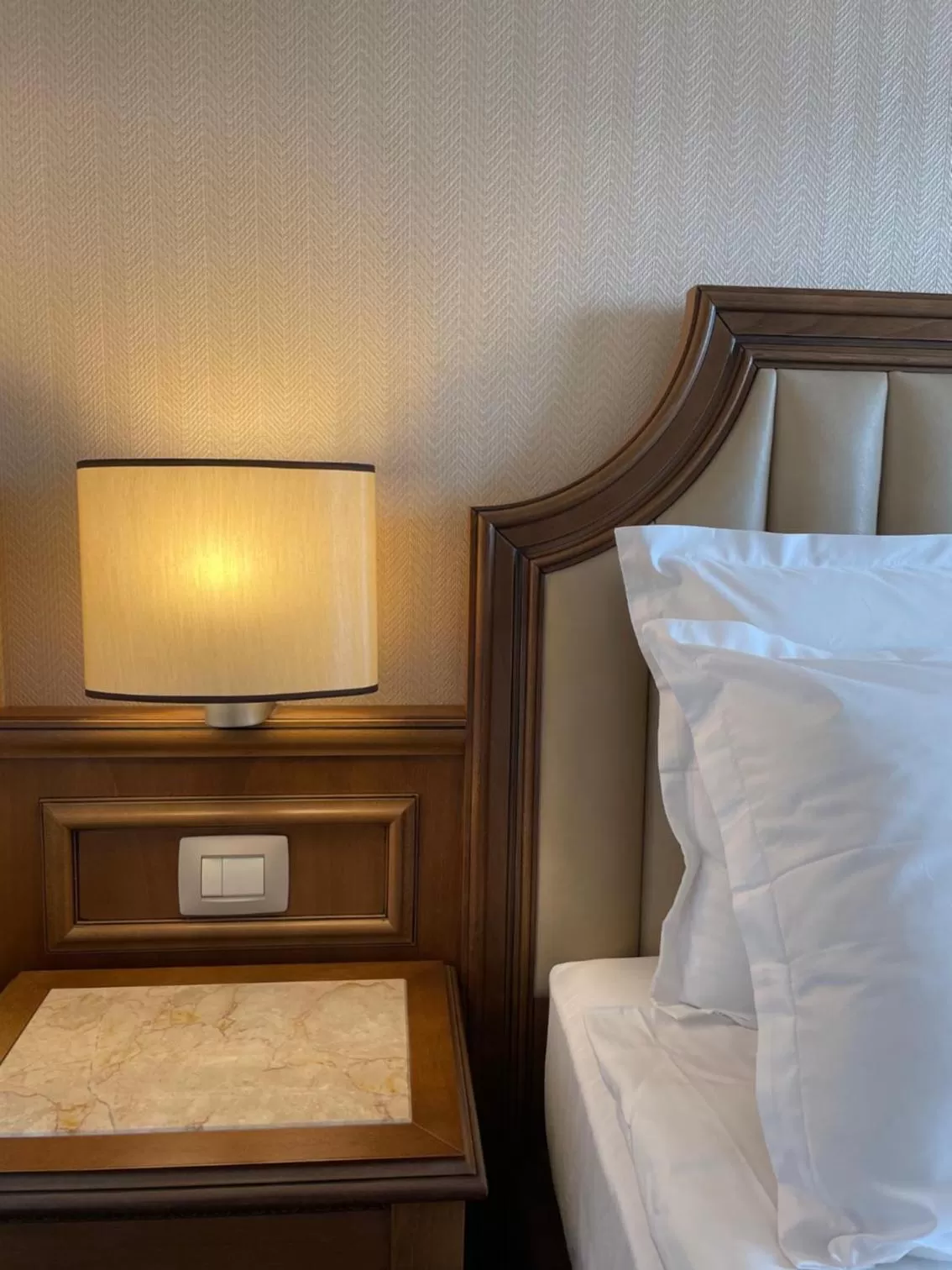 Bed in Astoria Grand Hotel