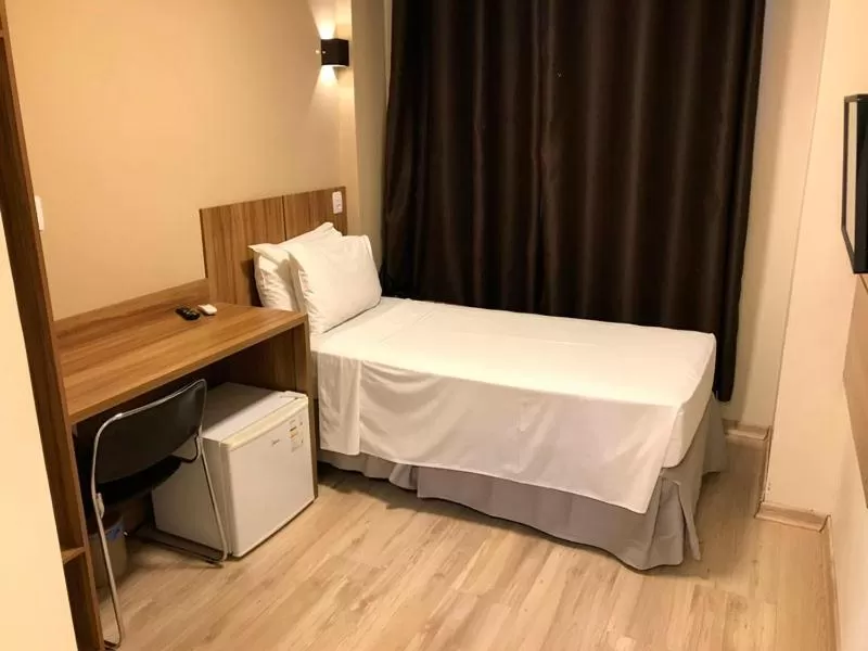 Bed in Minas Platinum Hotel & Convention