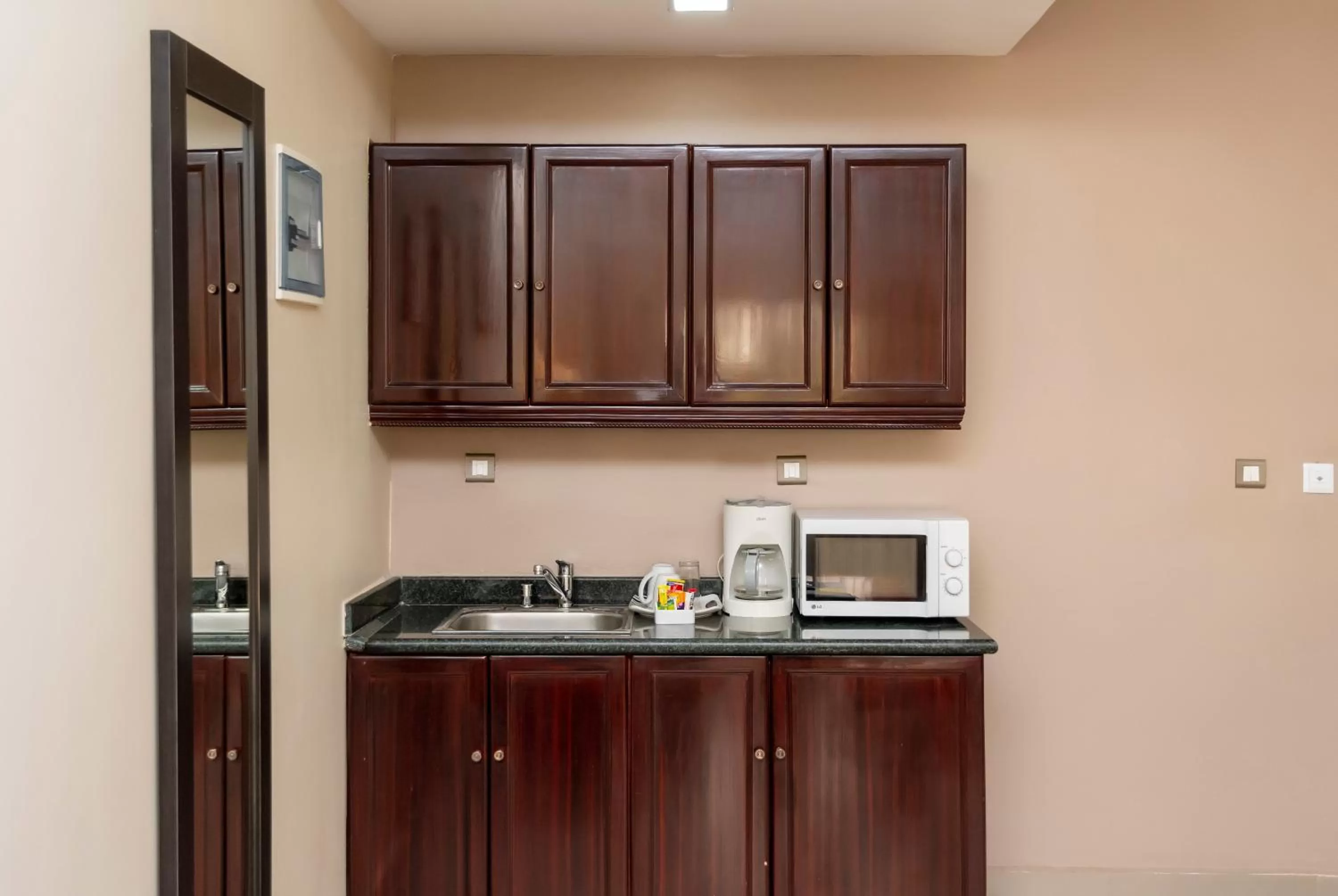 Kitchen or kitchenette in Hawthorn Suites by Wyndham Abuja