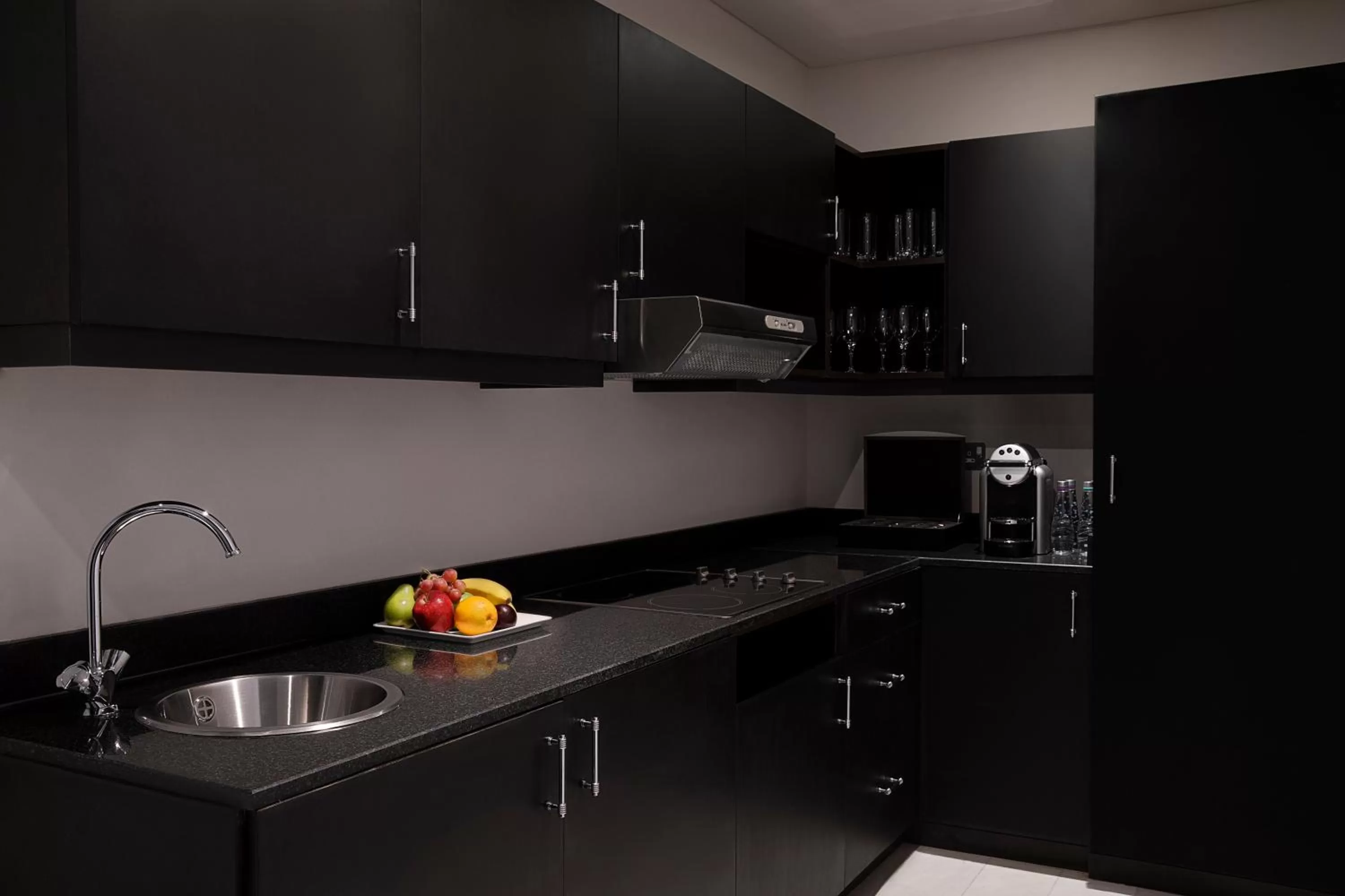 Kitchen or kitchenette in Voco - Riyadh by IHG