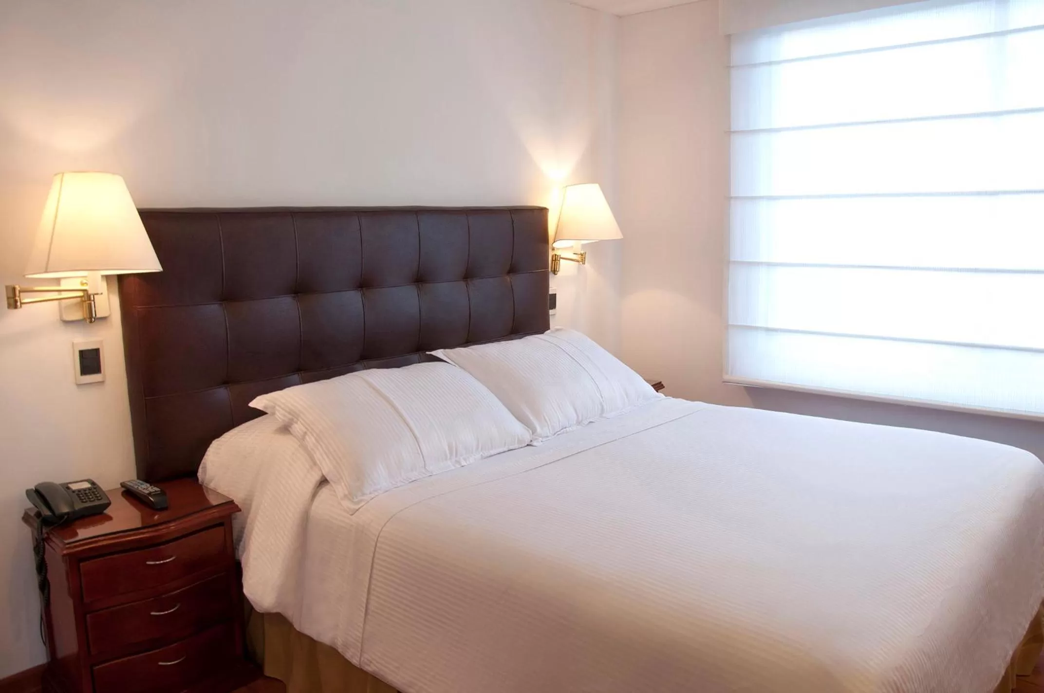 Photo of the whole room, Bed in Apartaestudios Los Andes