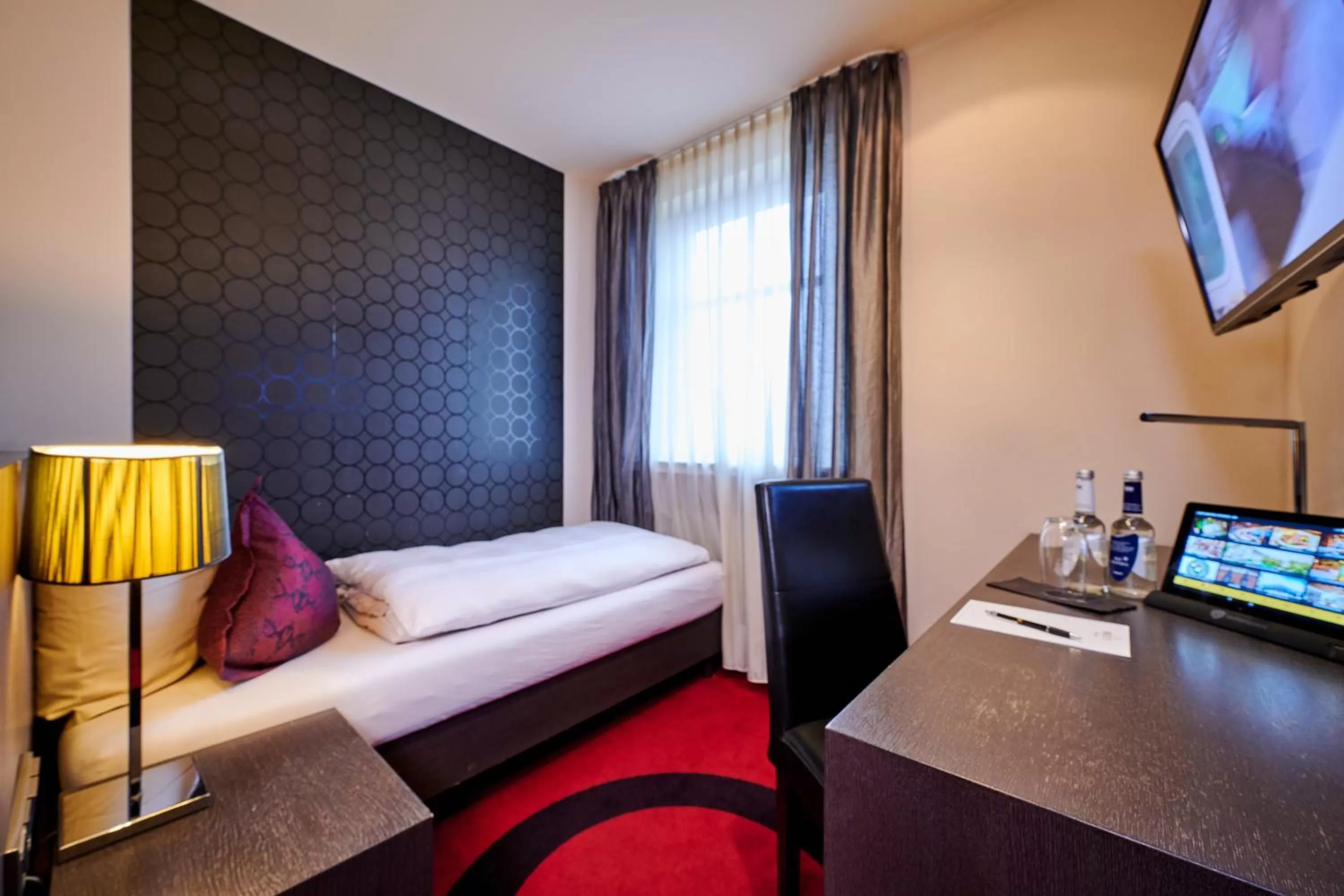 Photo of the whole room, Bed in Genusshotel Wenisch