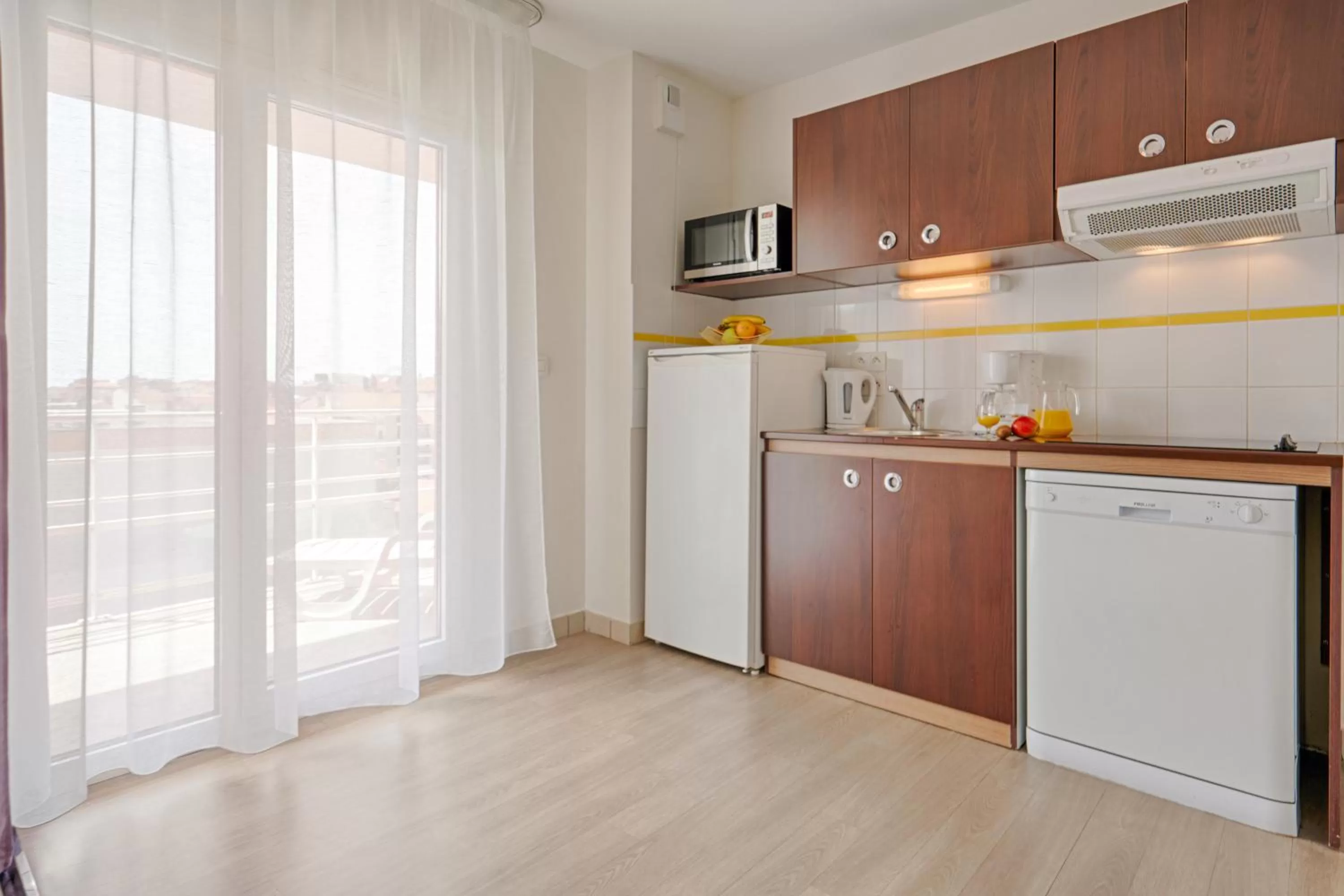 kitchen in Zenitude Hôtel-Résidences Béziers Centre