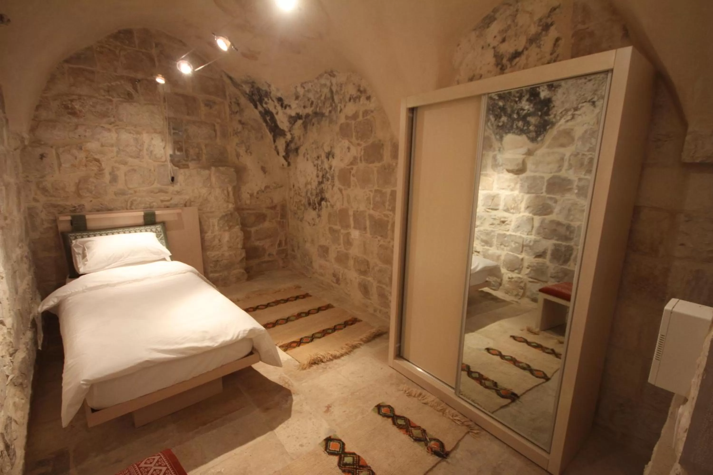 Bed in Khan Alwakala Hotel