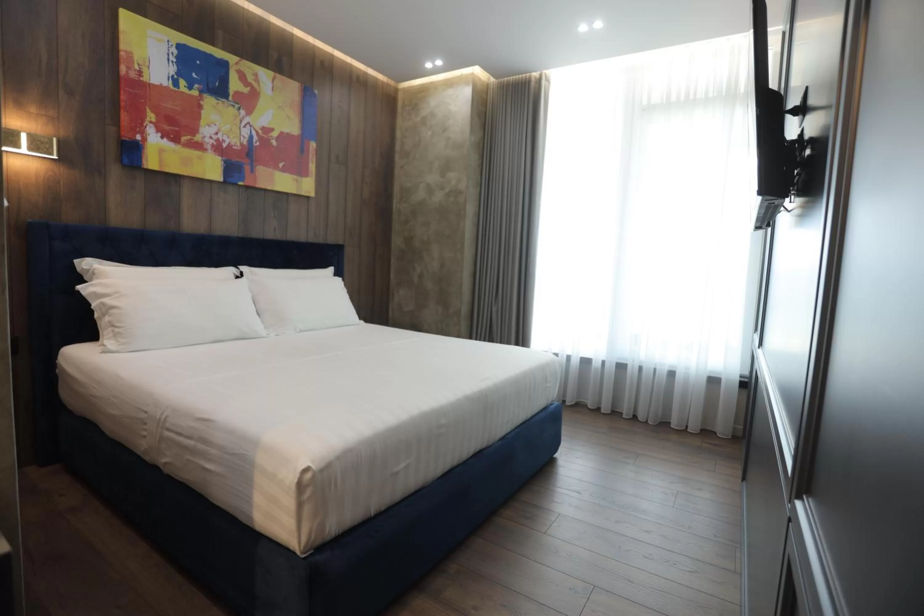 Bed in AP Hotel Boutique