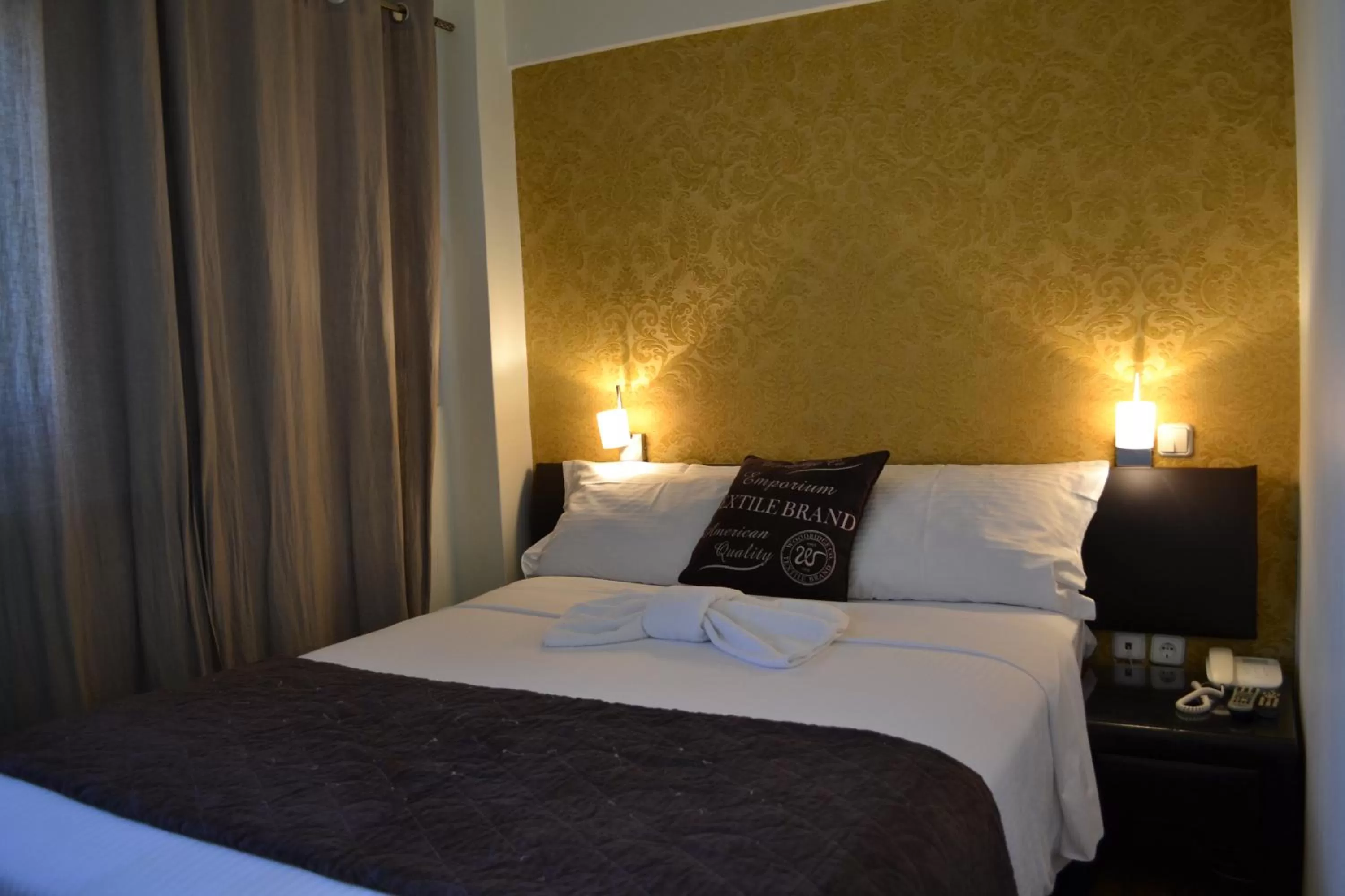 Bed in Rivitel Marousi Apartments