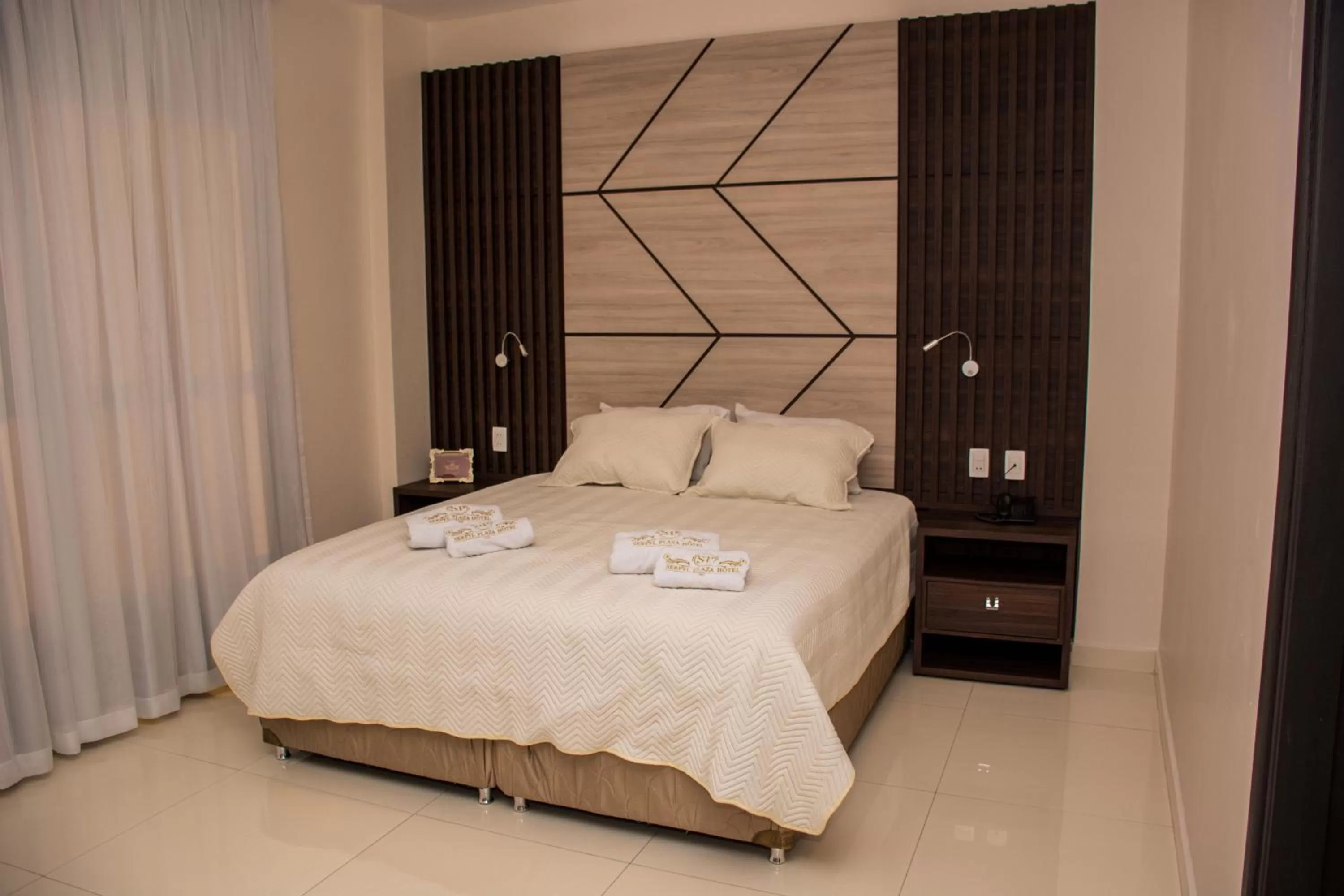 Bed in SERPYL Plaza Hotel