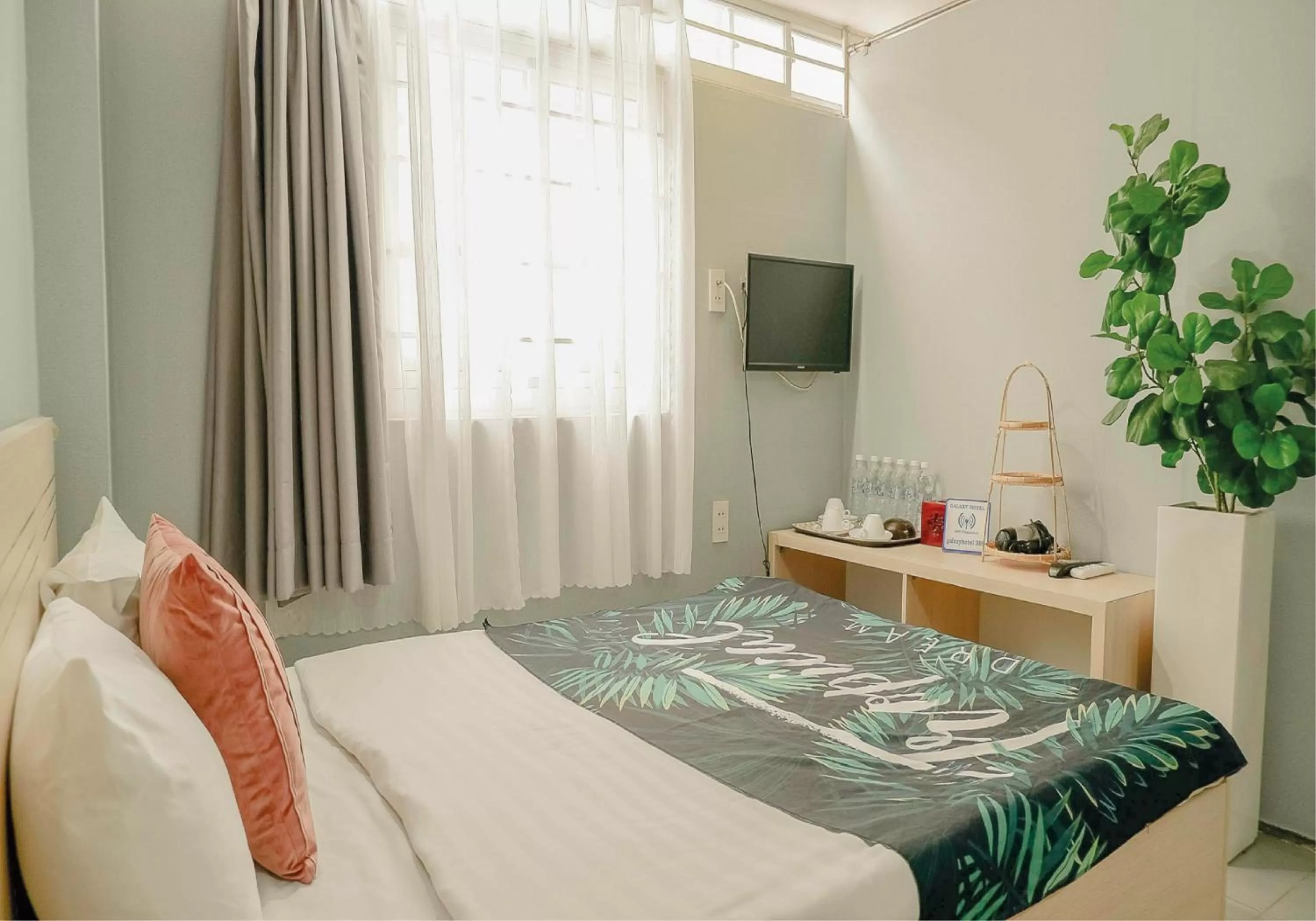 Bed in Galaxy Boutique Sai Gon Central Hotel