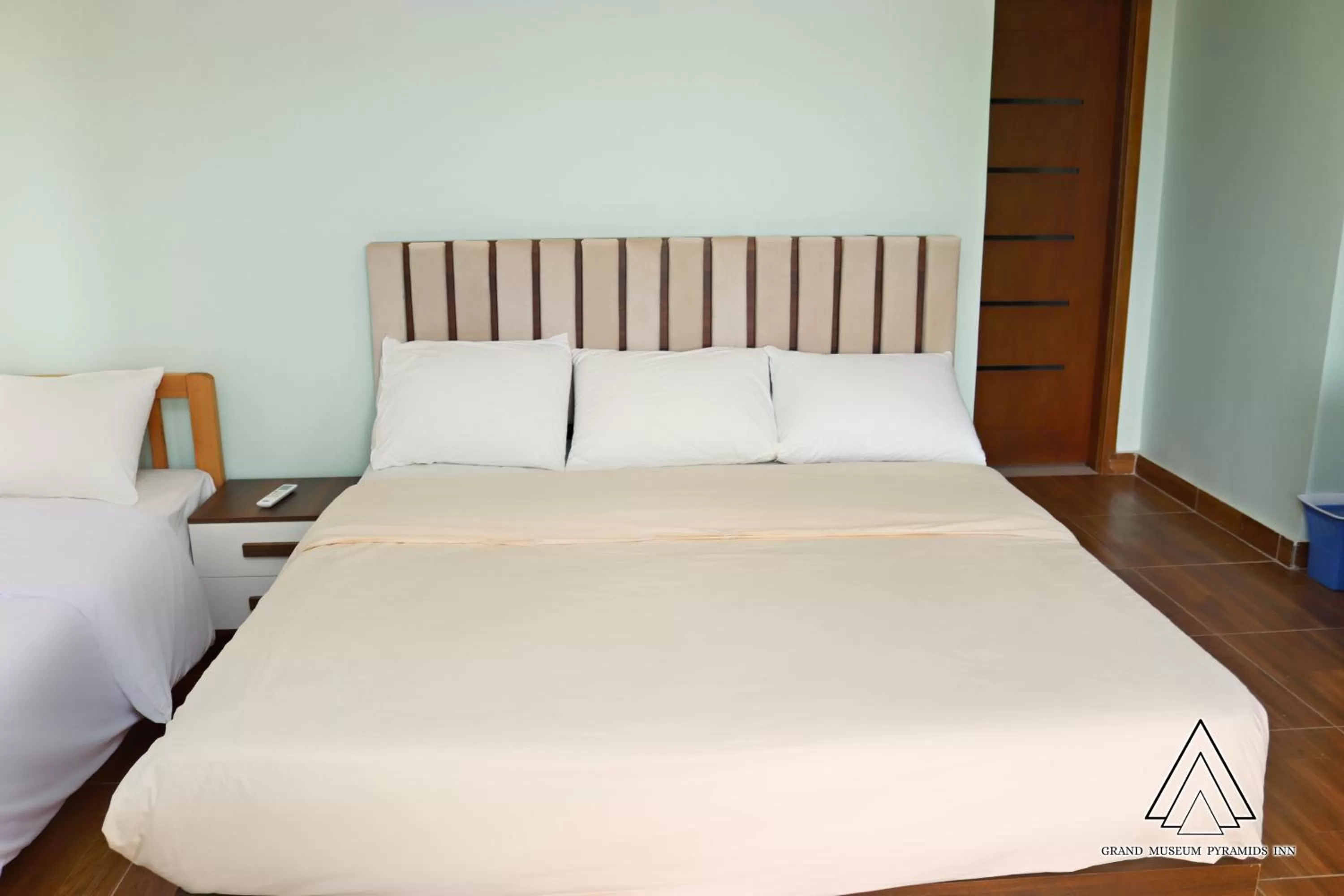 Bed in Grand Museum Pyramids Inn