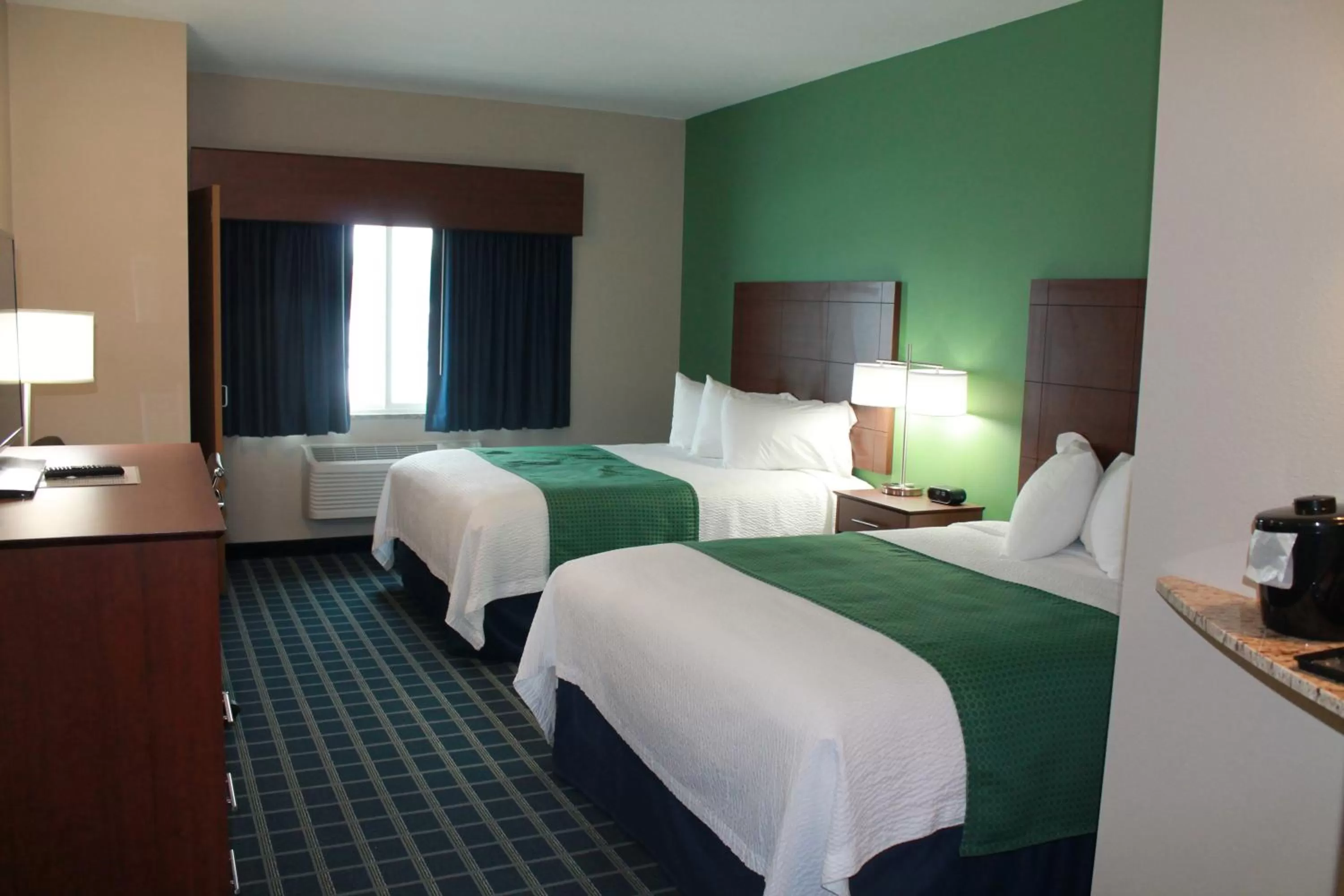 Bed in Brookstone Lodge & Suites - Emmetsburg