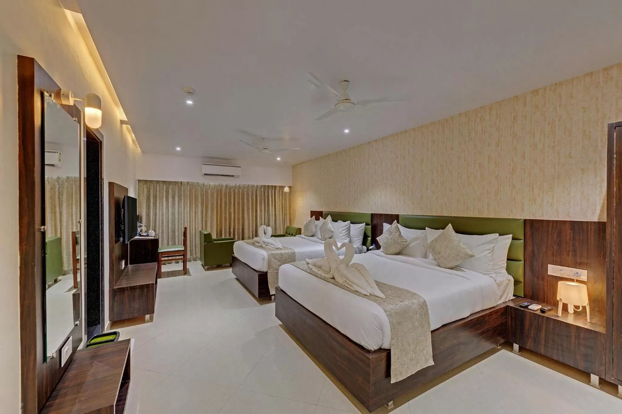 Bedroom, Bed in Guruprerna Beacon Resort, Dwarka
