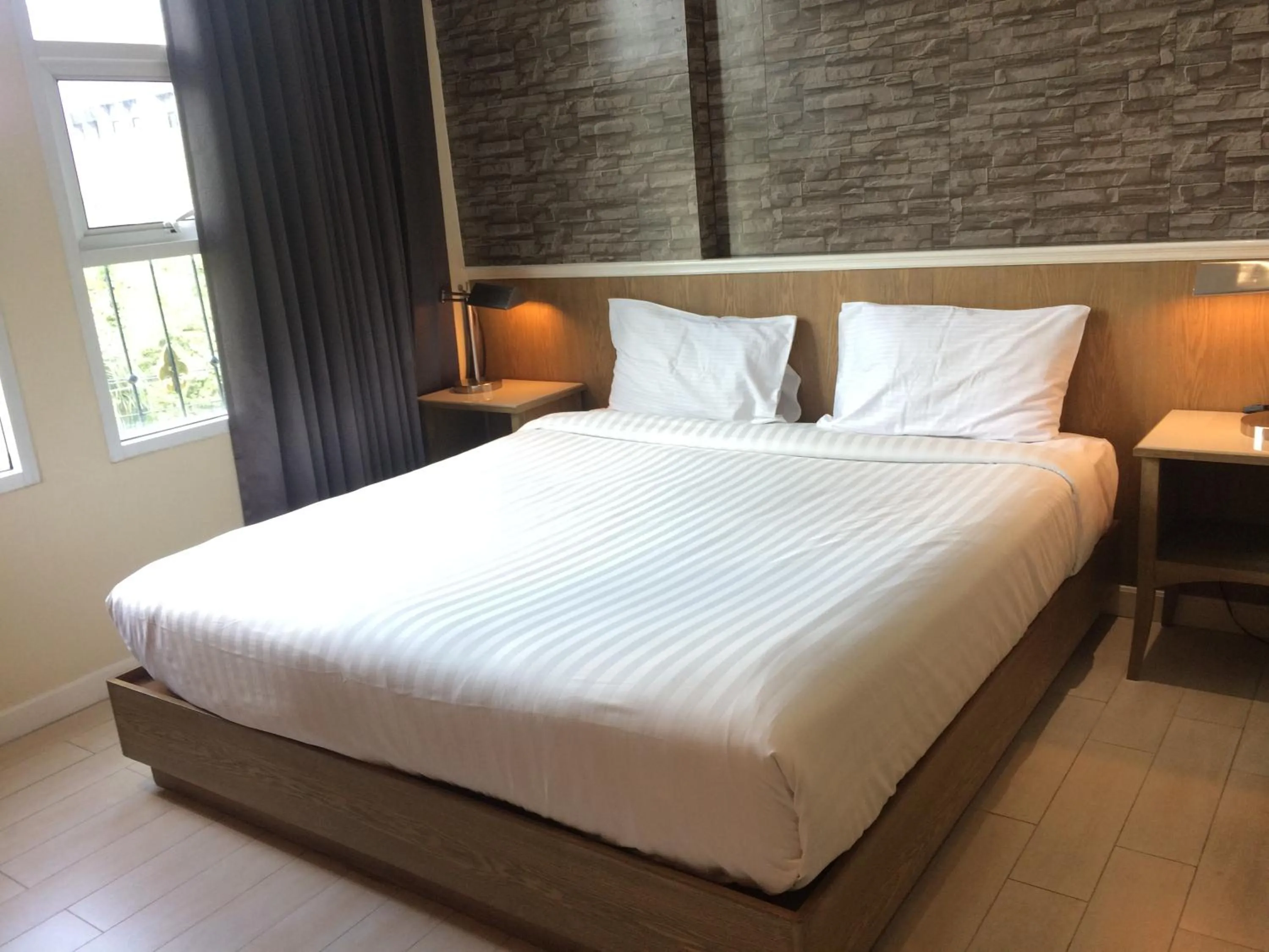 Bed in Bourbon St. Boutique Hotel