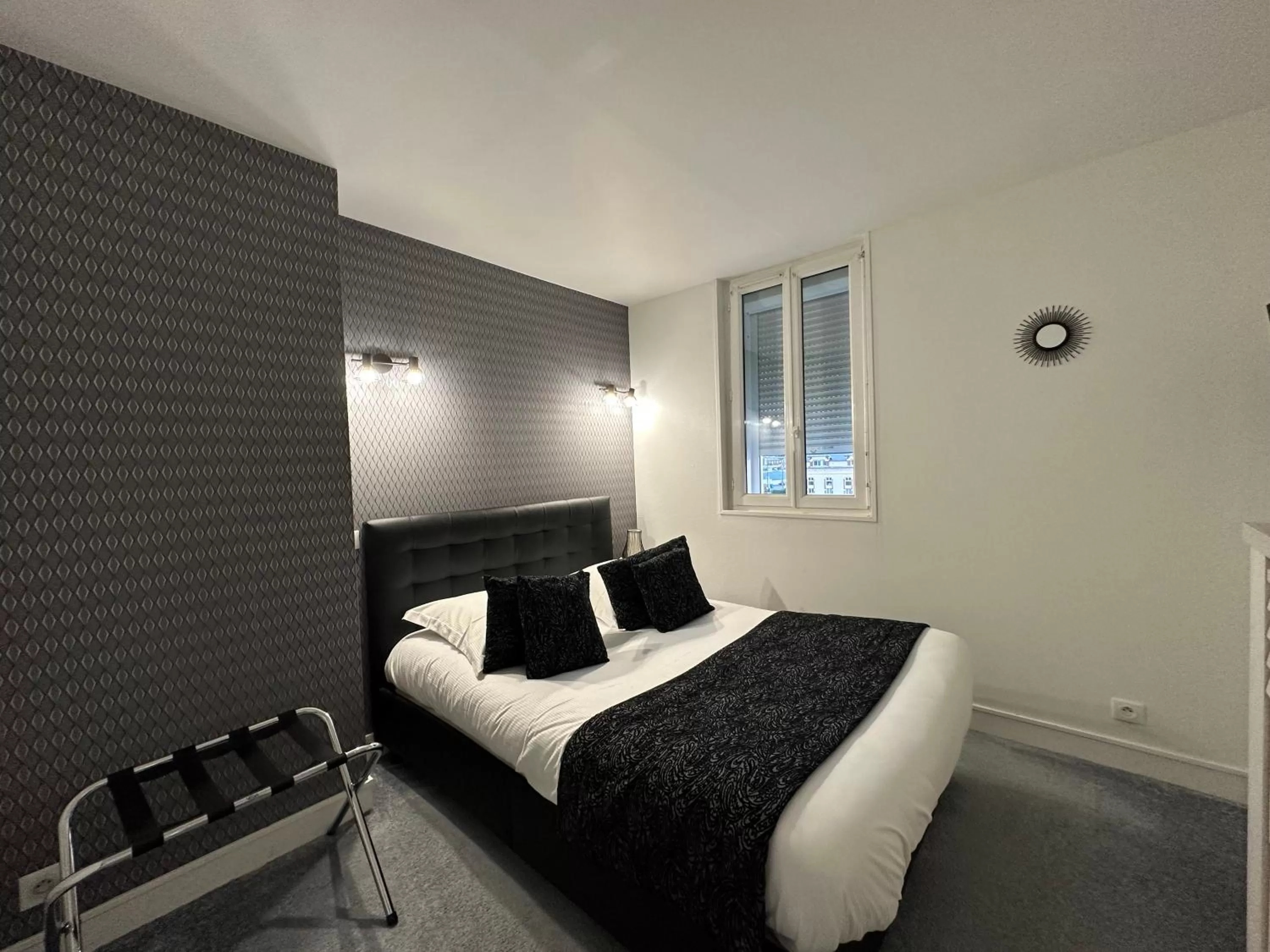 Bed in Hotel Le Saint-Yves