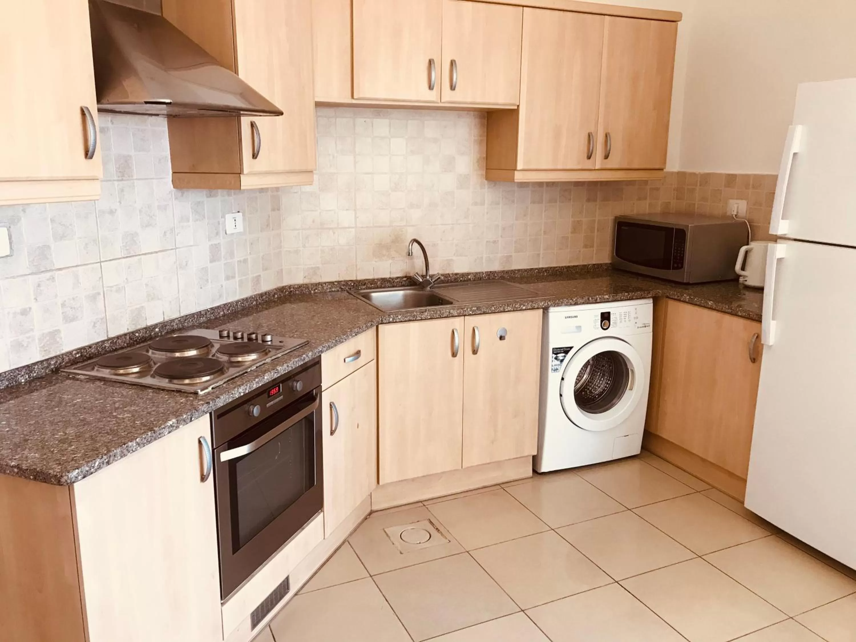 Kitchen or kitchenette in Tala Bay Residence - Families Only