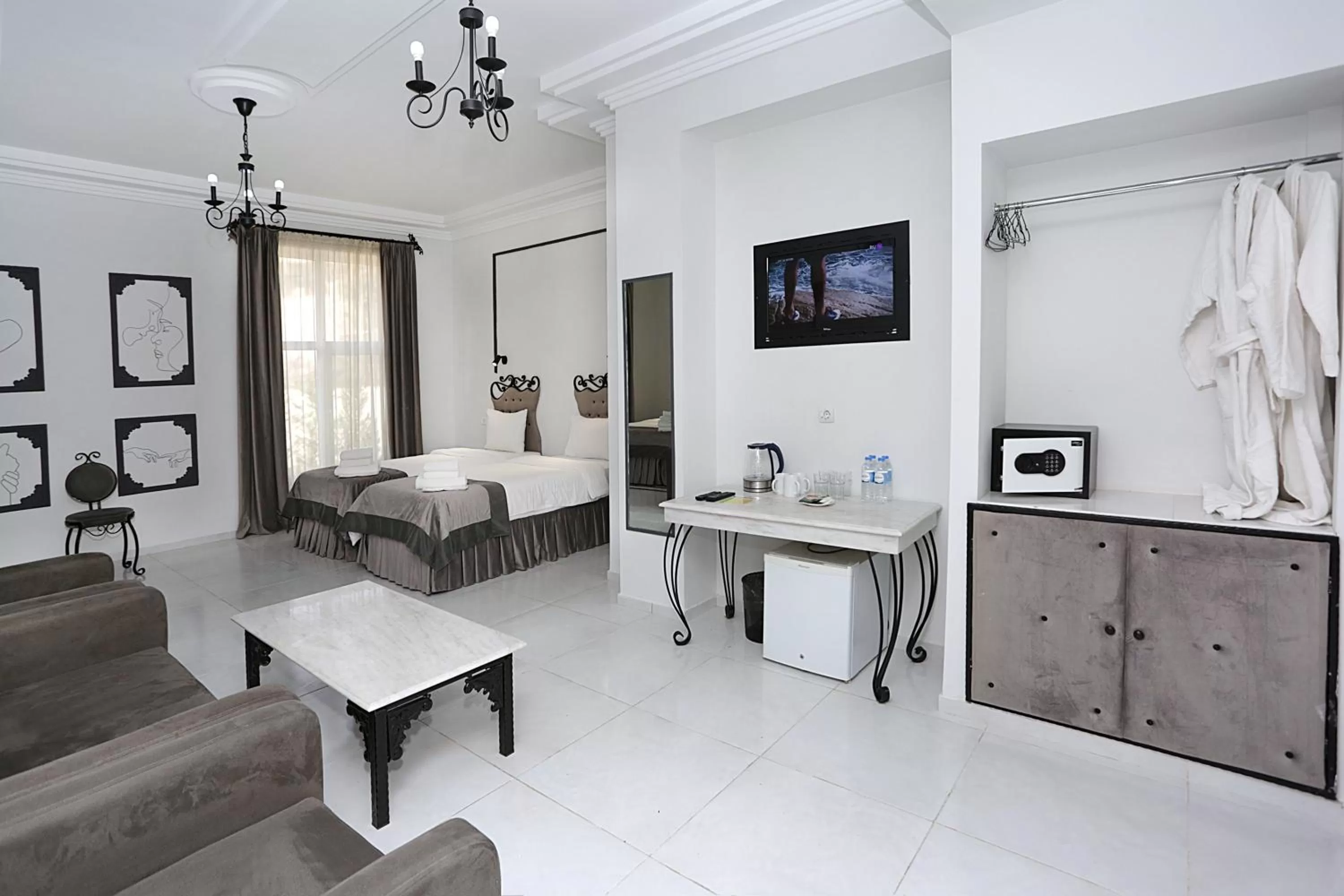 Photo of the whole room, Bed in The One Boutique