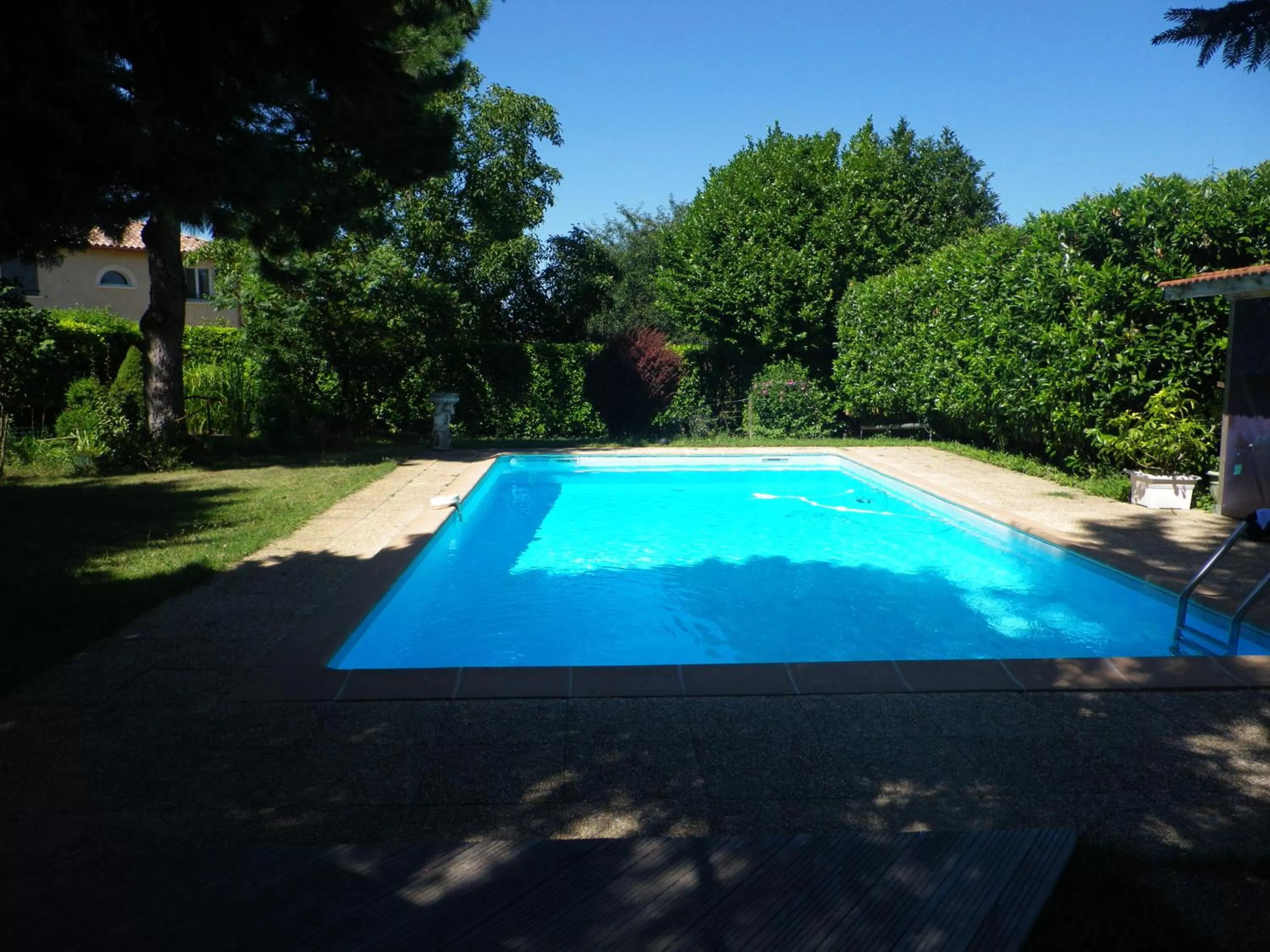 Swimming pool in Chambres d'Hôtes Mado et Lulu