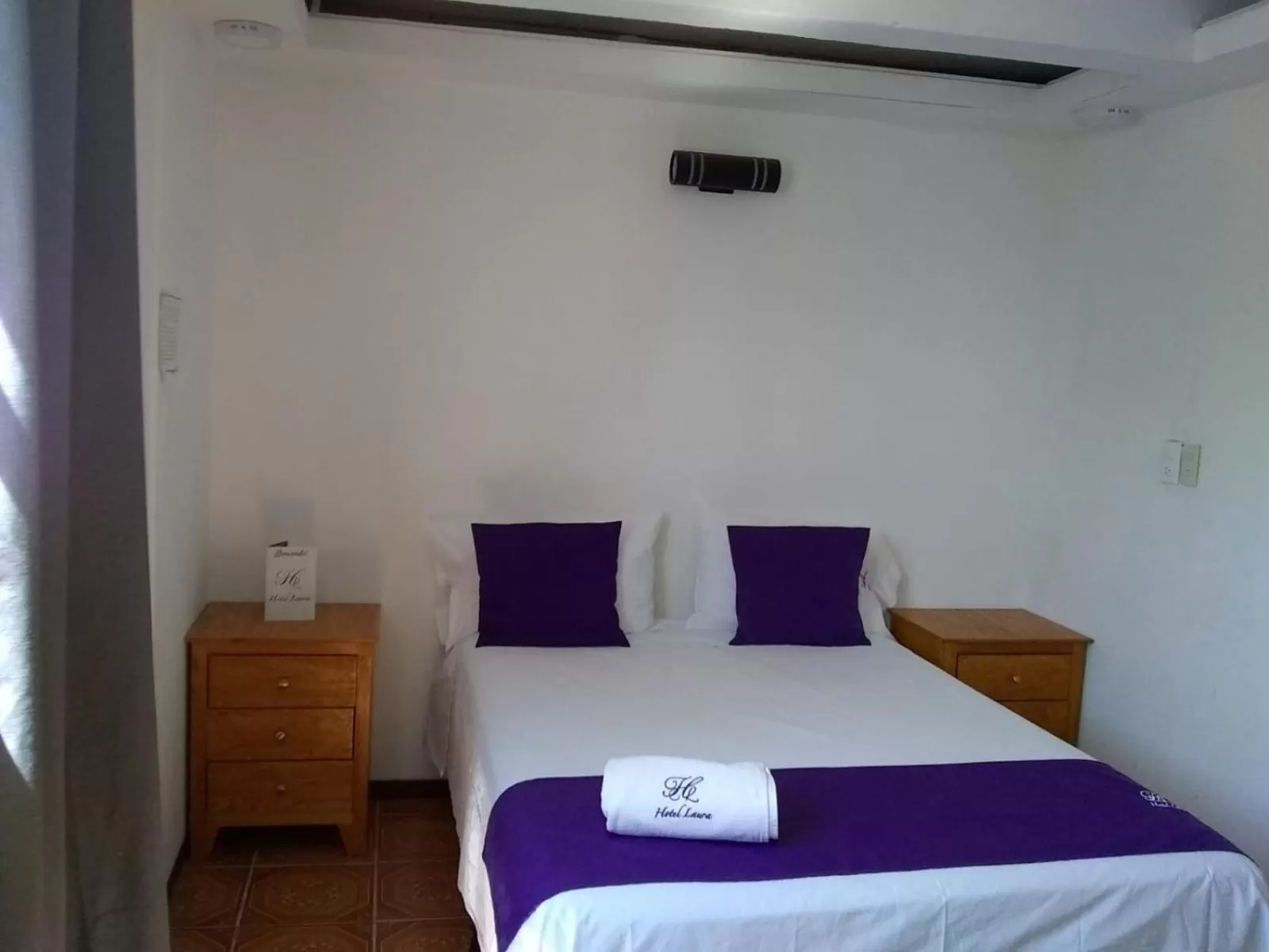 Bed in Hotel Posada Laura