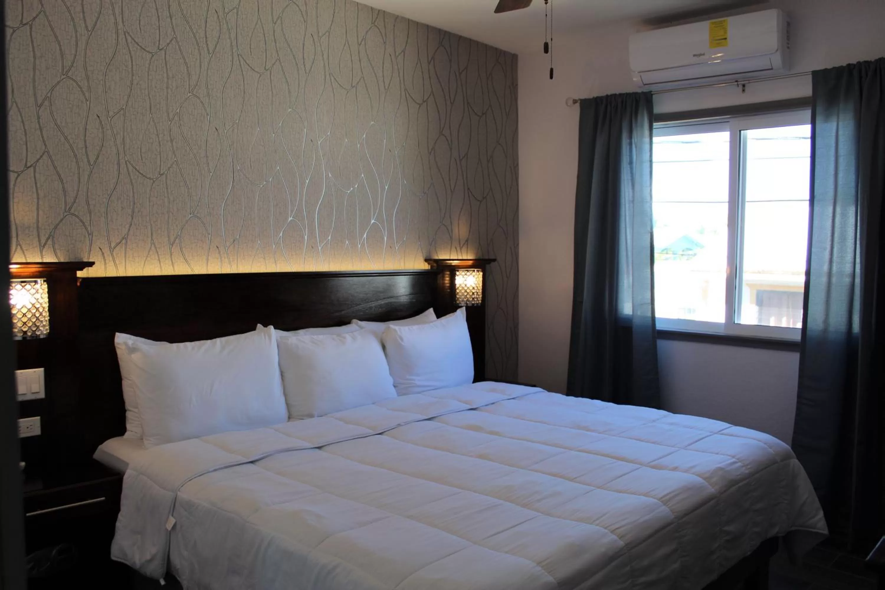 Bed in Barefoot Caye Caulker Hotel