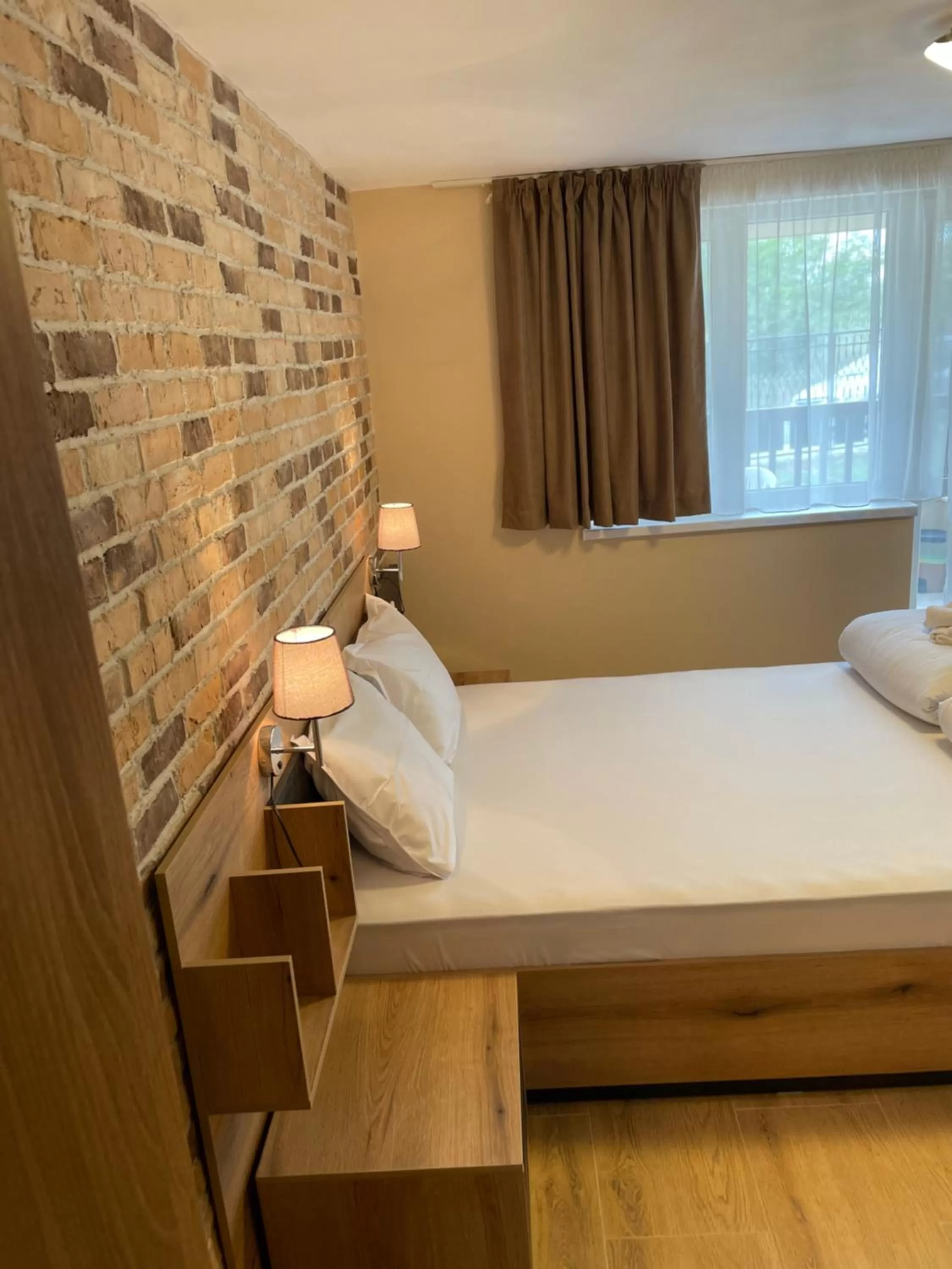 Bed in Family Hotel Malibu