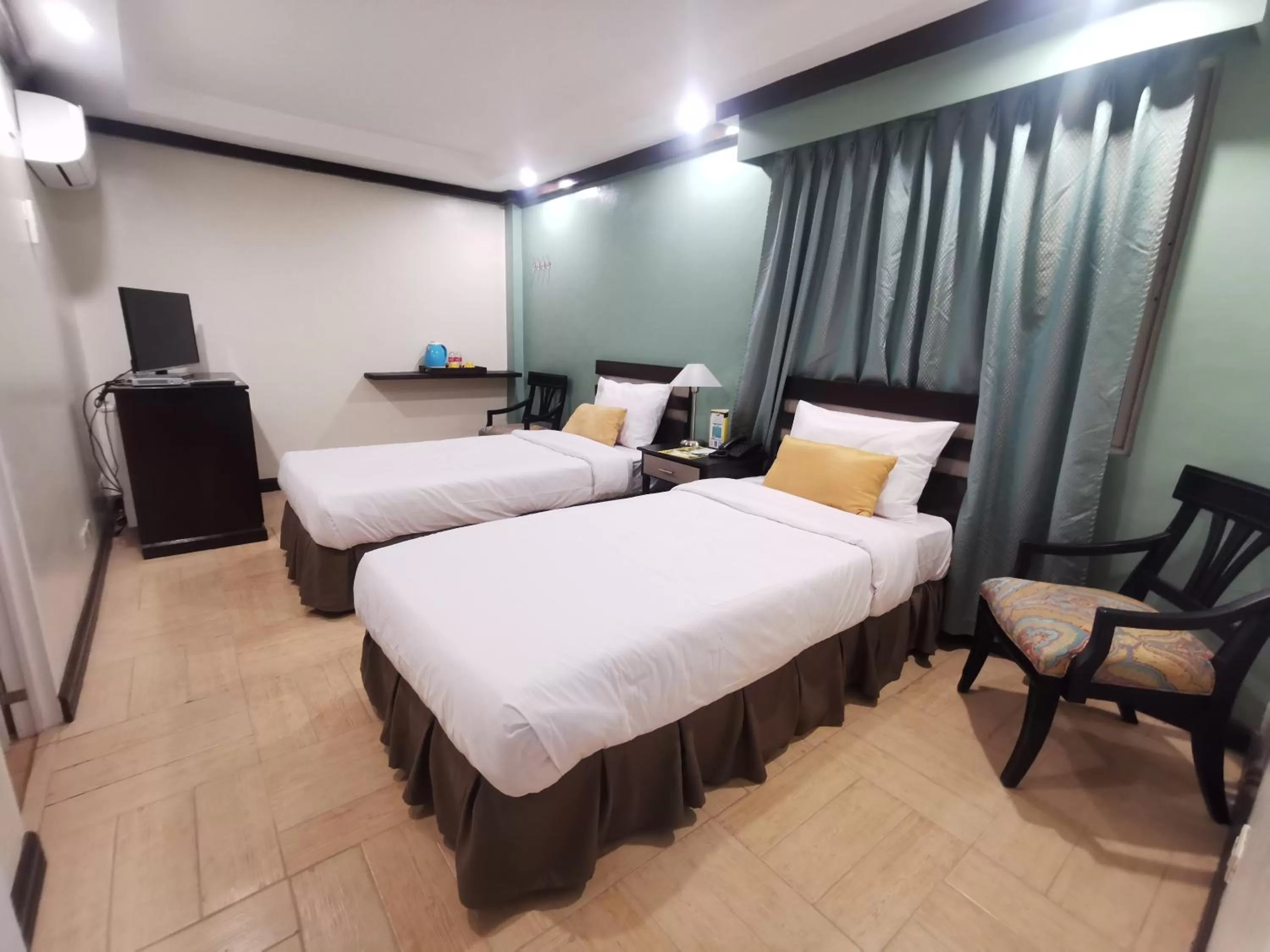 Photo of the whole room, Bed in Tagaytay Country Hotel