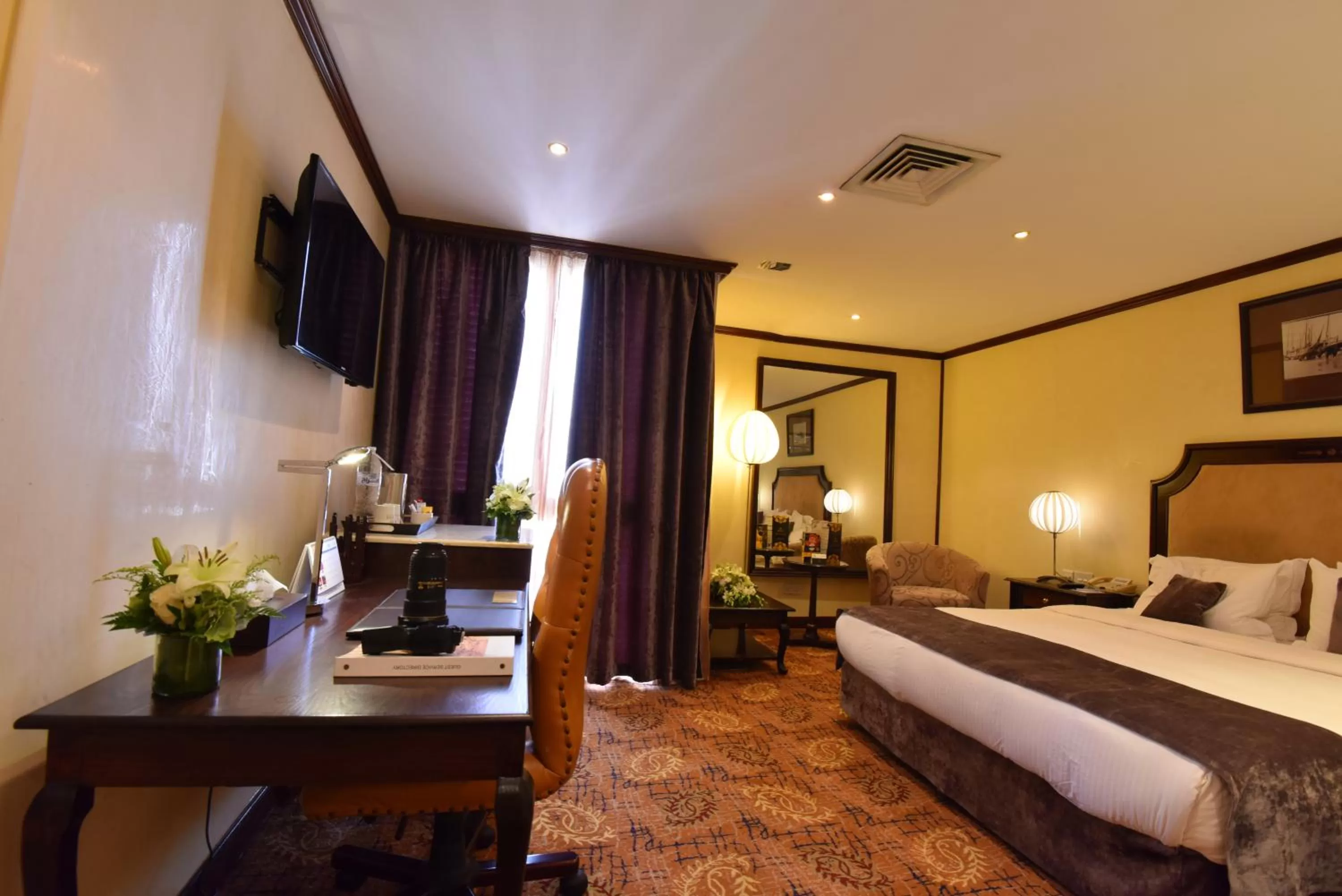 Communal lounge/ TV room in Inn & Go Kuwait Plaza