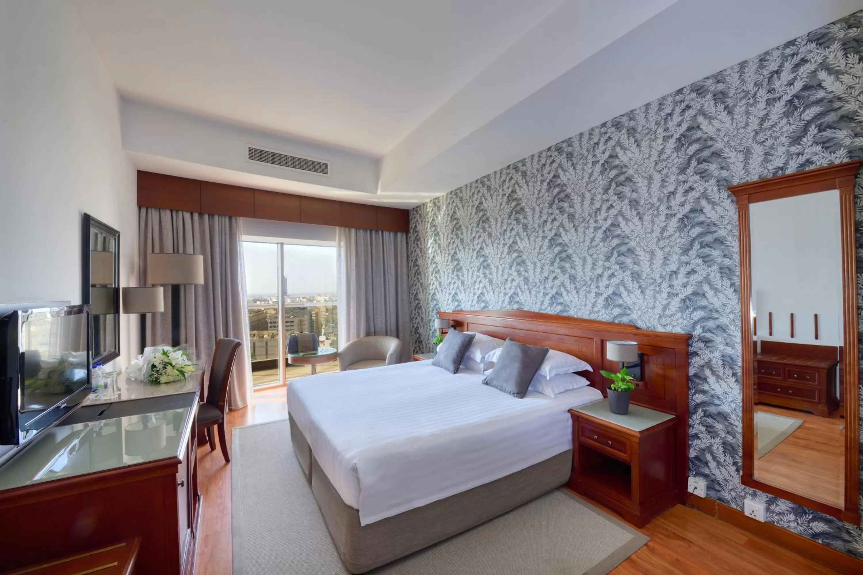 Bed in Majestic City Retreat Hotel