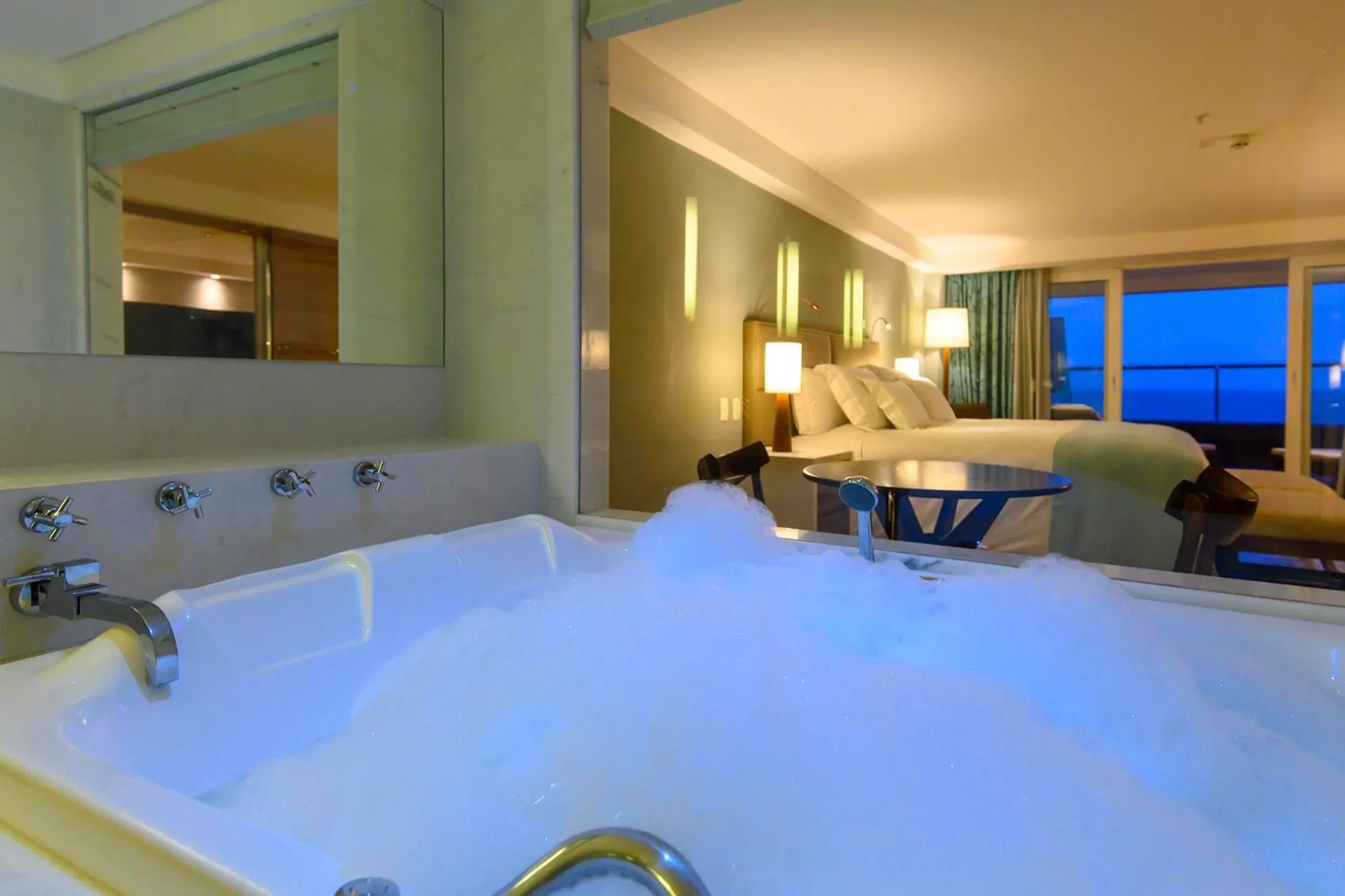 Bed in Vogal Luxury Beach Hotel & SPA