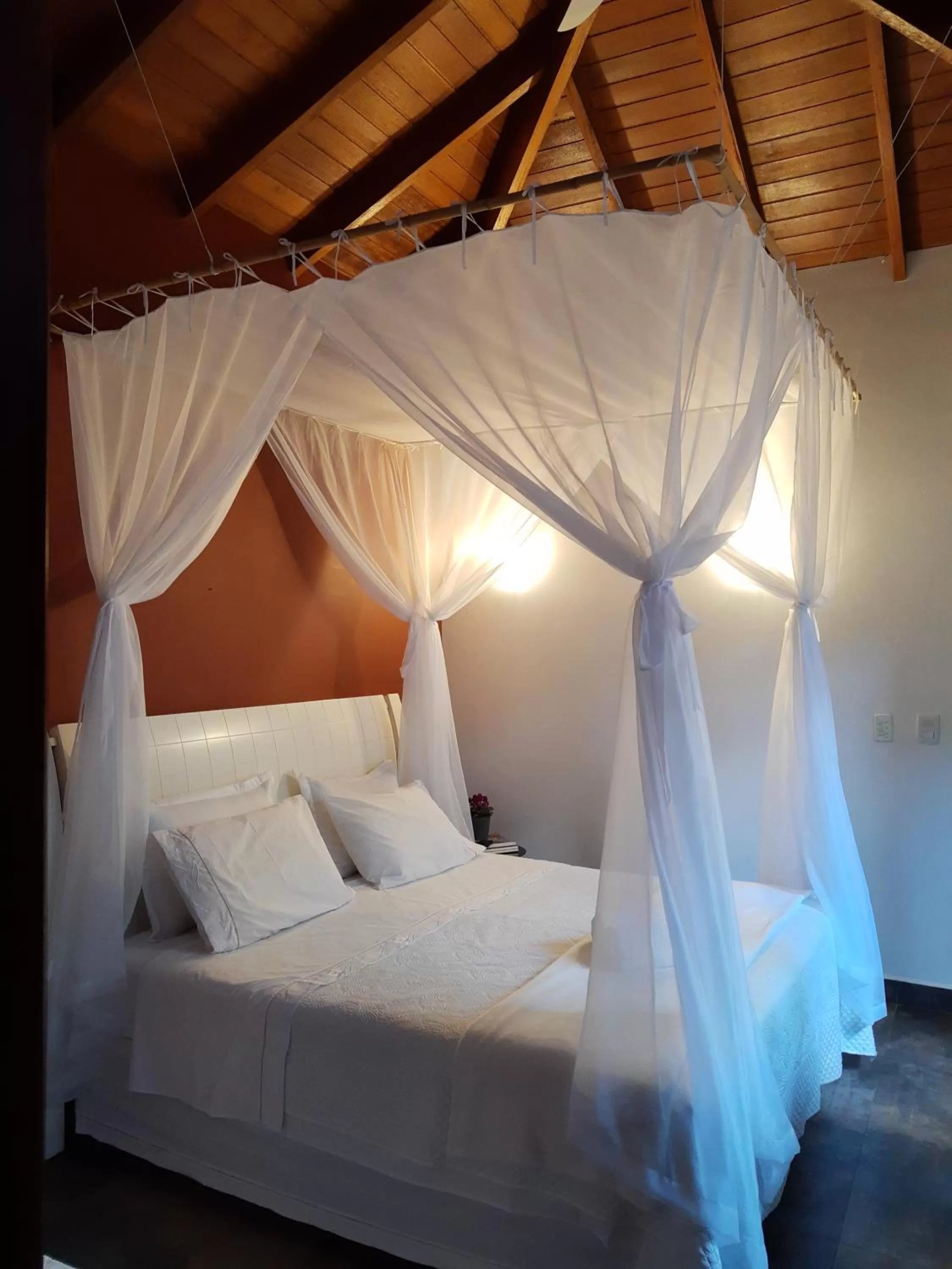 Bed in Magias de Paraty Ecopousada