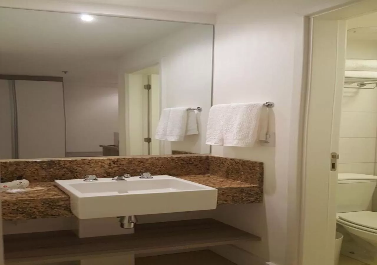 Bathroom in Ramada by Wyndham Macae Hotel & Suites