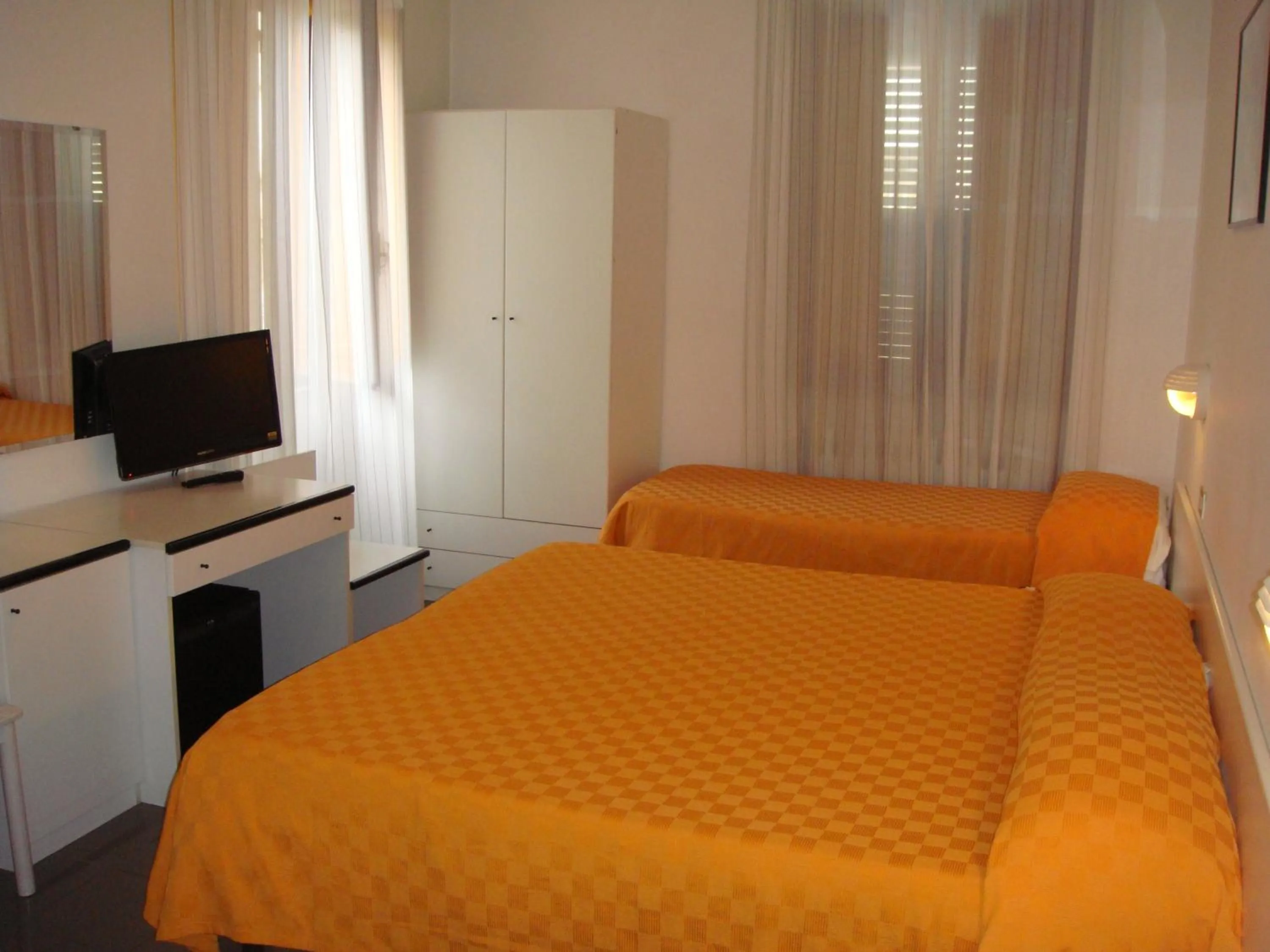 Bed in Hotel La Meridiana