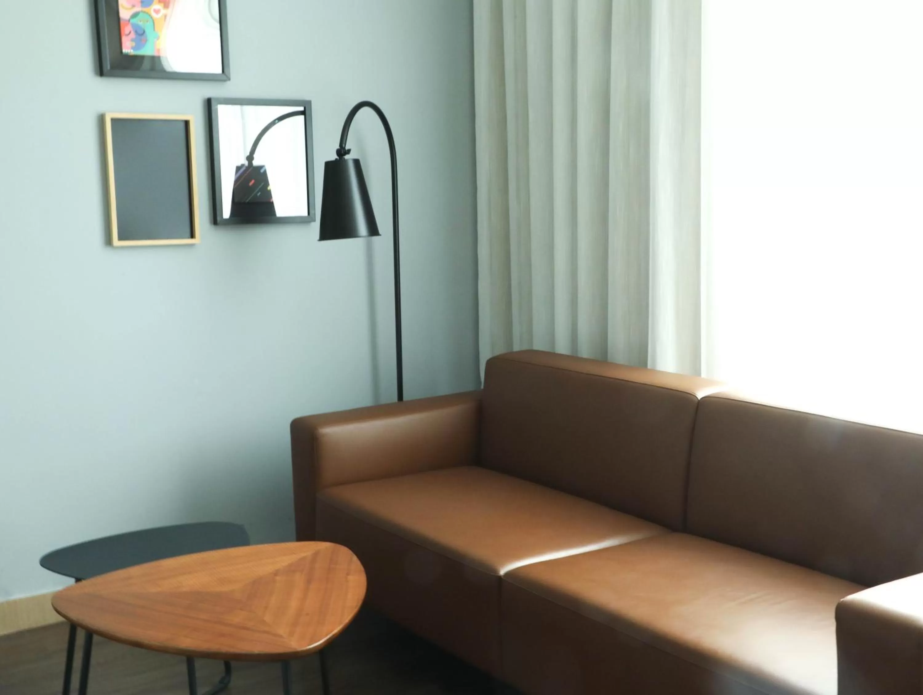 Seating area in Moxy Shenzhen North Station