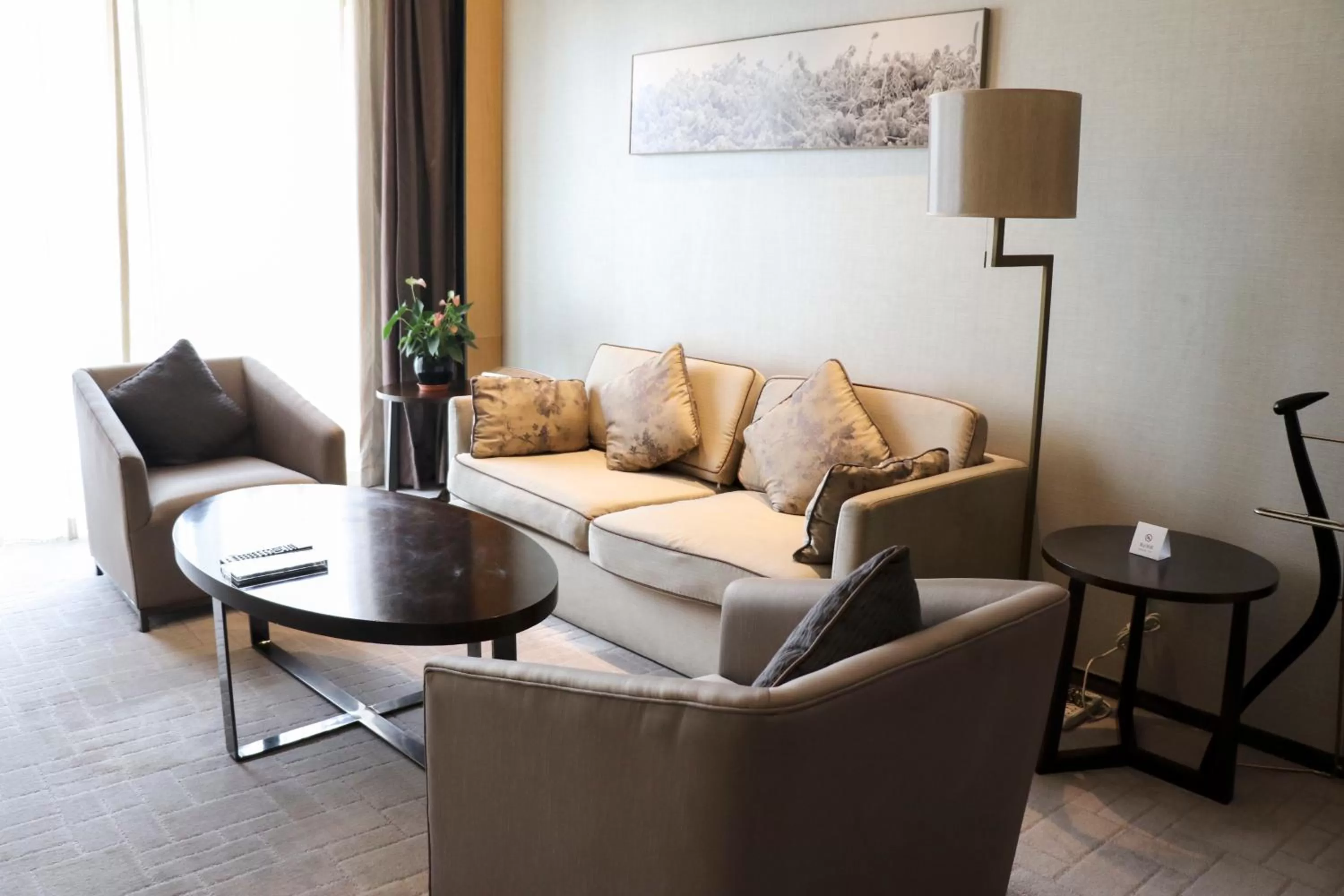 Living room in Crowne Plaza Beijing Lido by IHG