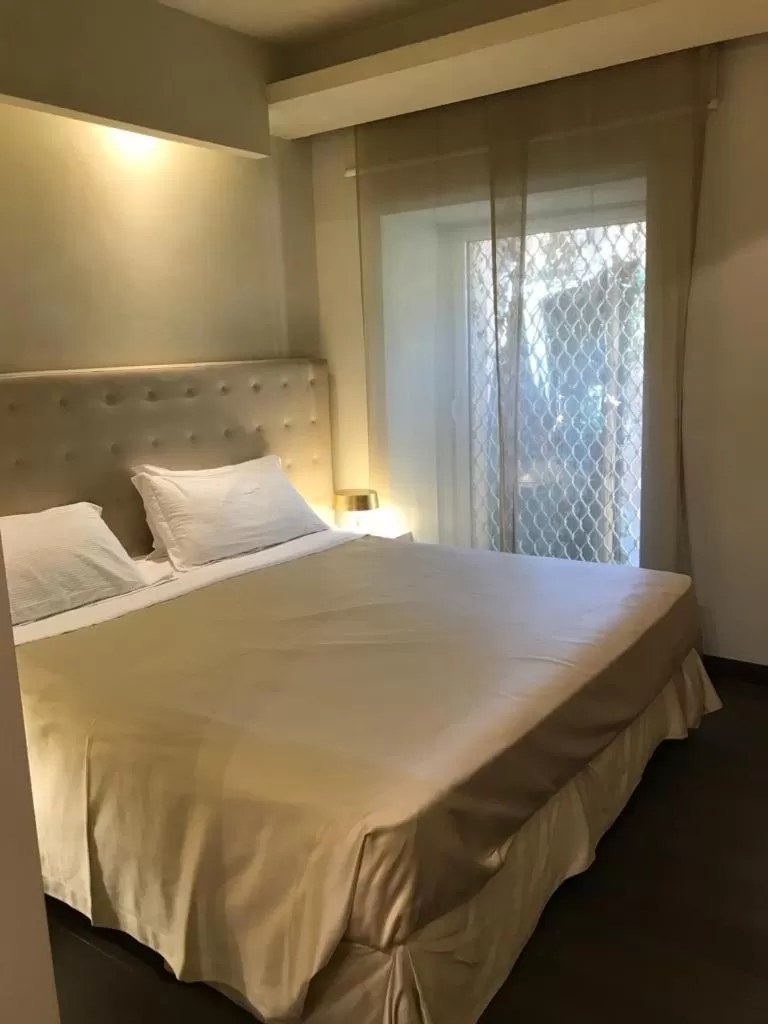 Bed in Hotel Romano House