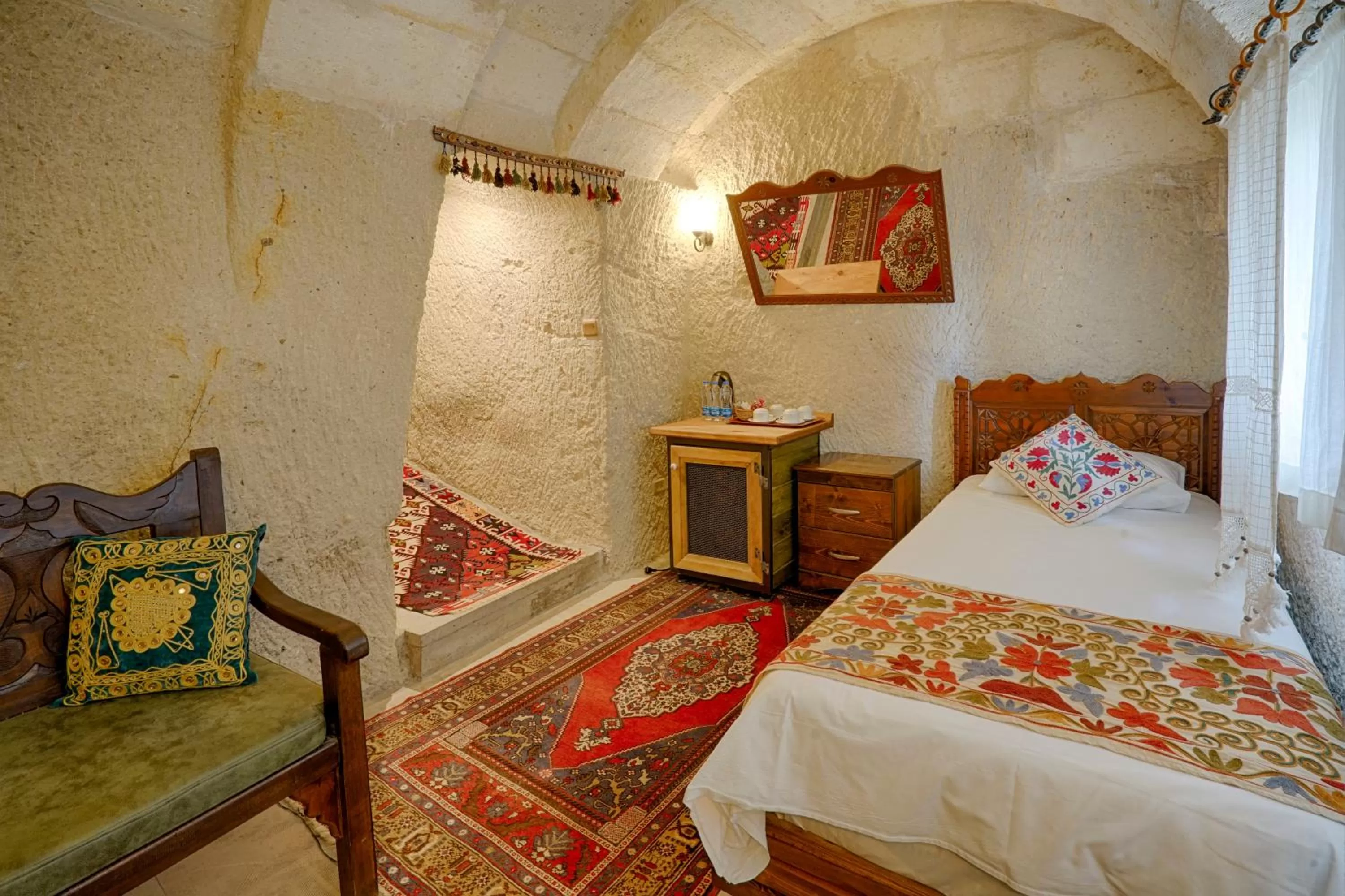 Bed in Tulip Cave Suites