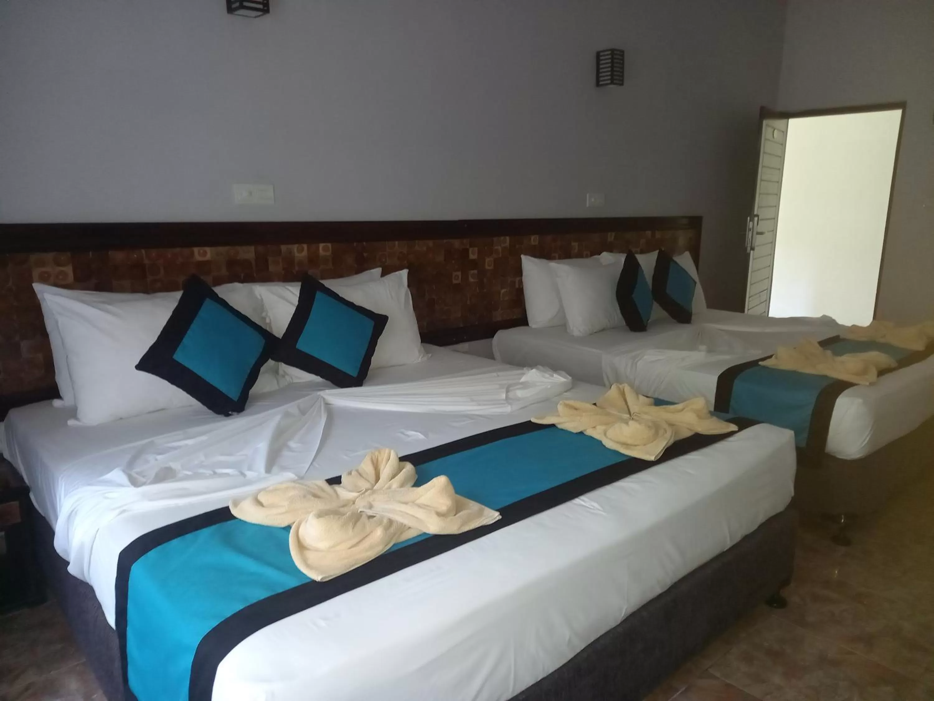 Bed in Blue Sand Beach Resort