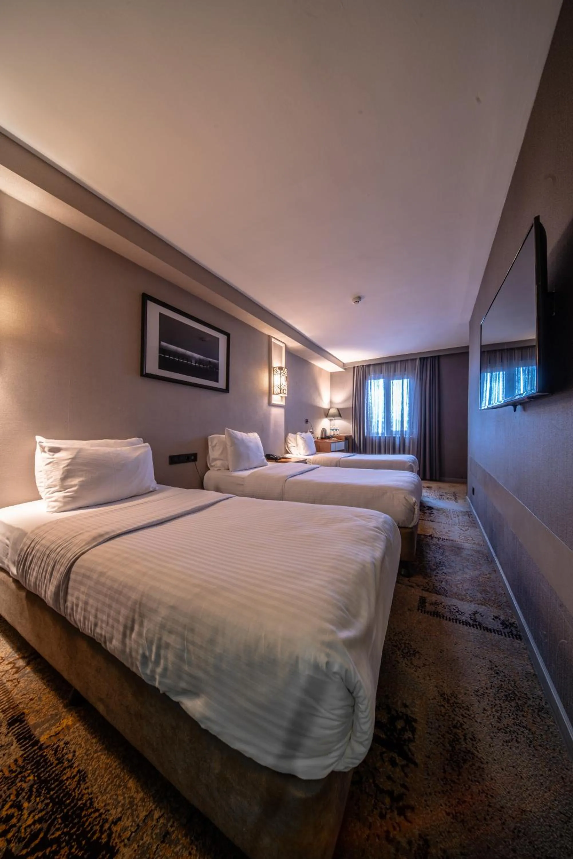 Bed in All Seasons Hotel