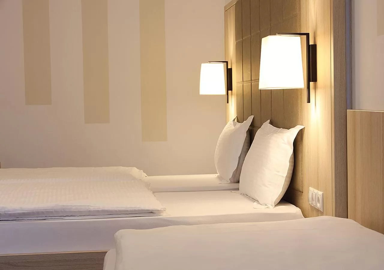 Bed in Hotel Brenner