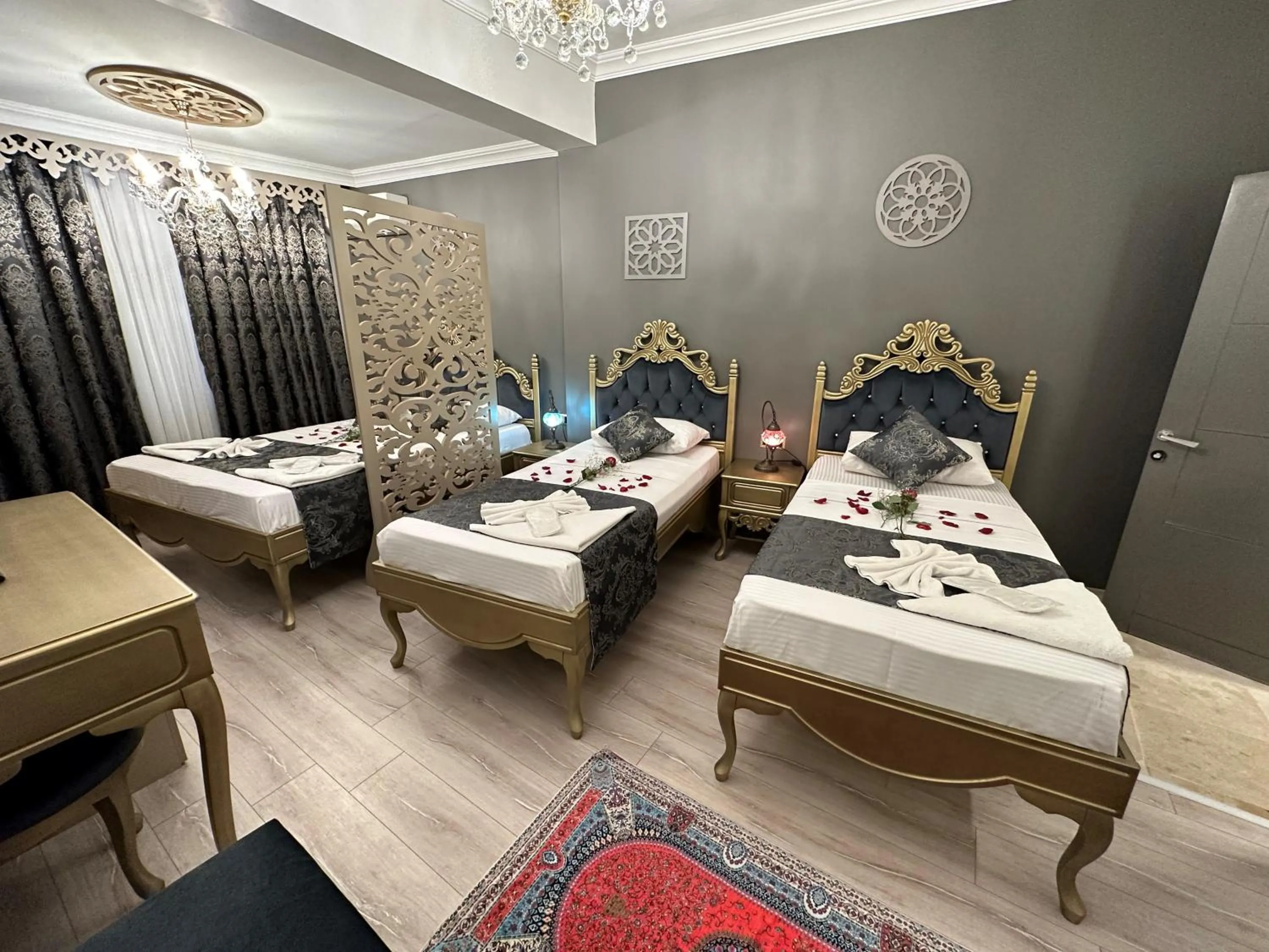 Bed in Ethnica Suites